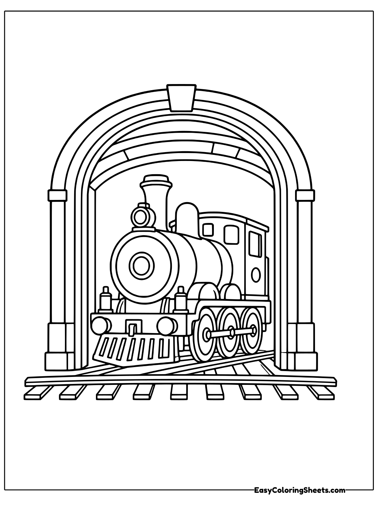 A steam locomotive rolls out from under a curved roundhouse doorway onto the tracks.