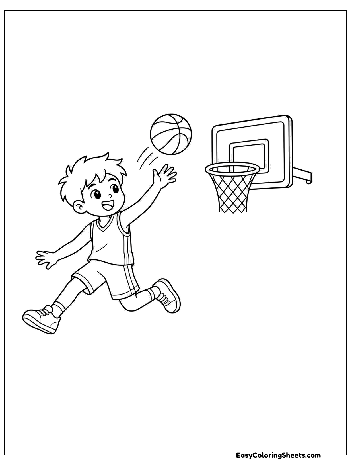 A boy leaps toward a basketball hoop as he throws the ball for a tricky shot.