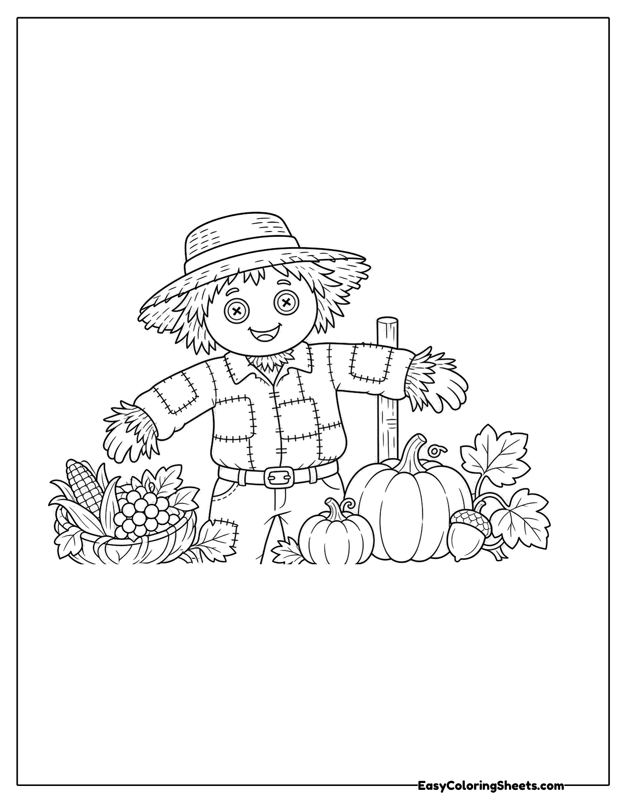 Small scarecrow on a post in a harvest scene with pumpkins, corn and autumn leaves