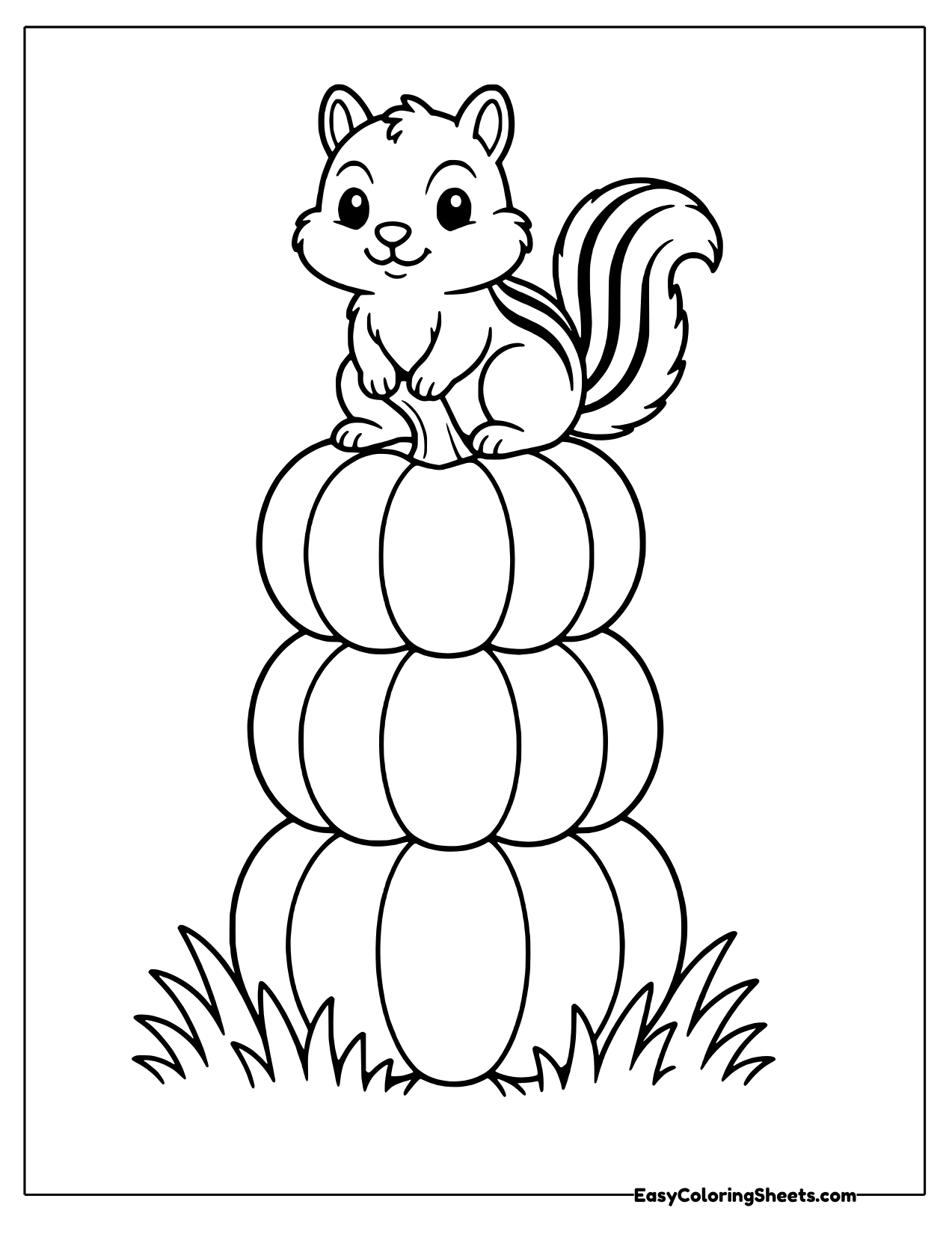 Chipmunk on a tall tower of pumpkins