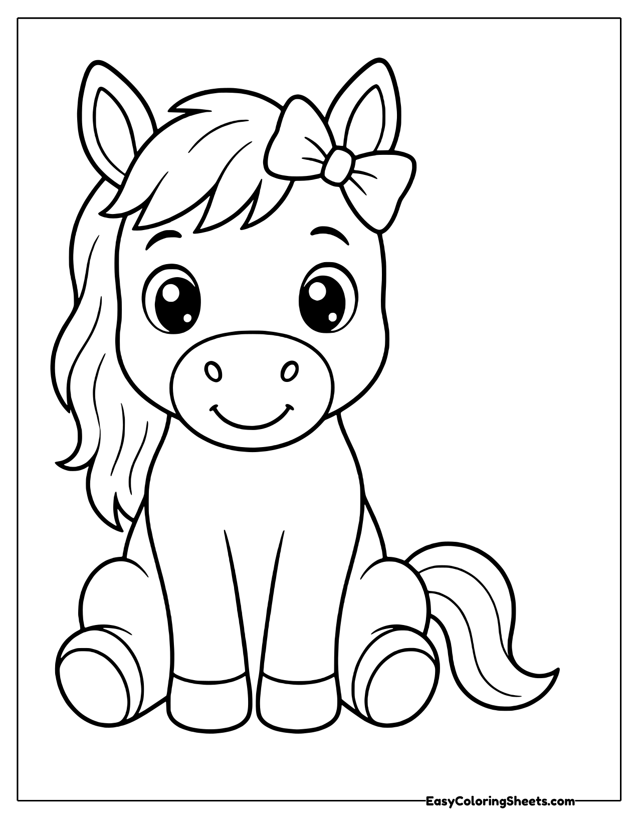 Young horse sitting upright facing forward with a bow in its mane