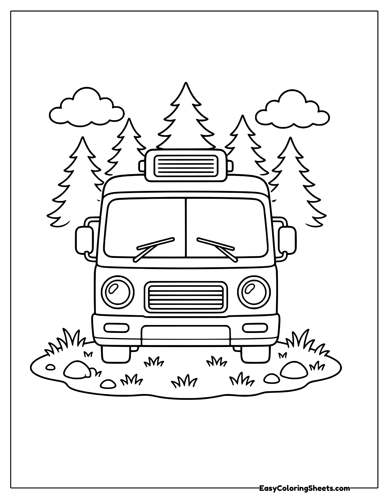 Motorhome front view among pine trees