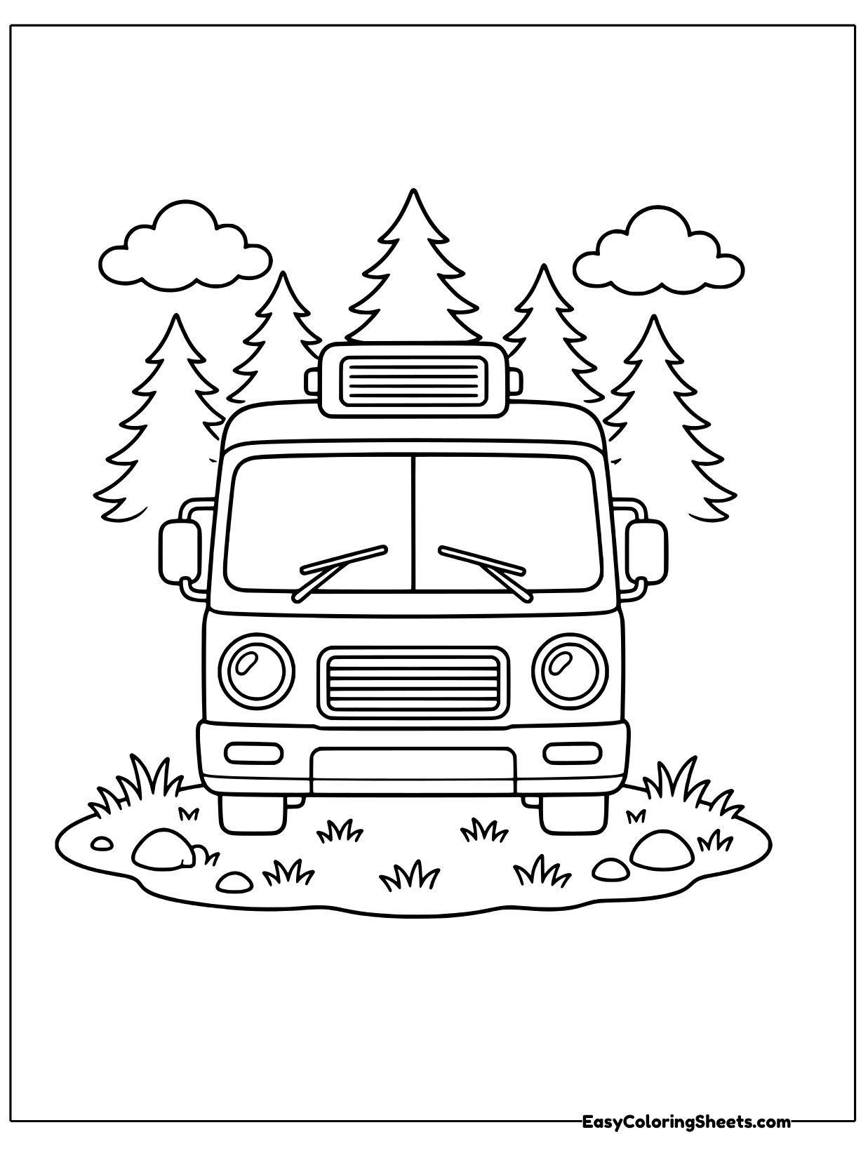 A motorhome seen from the front shows a wide windshield, headlights and a grille, parked between tall pine trees.