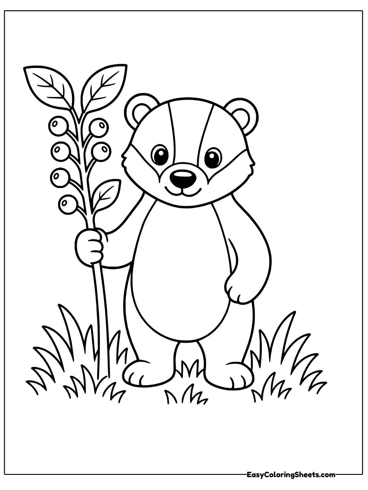 A badger holds a tall branch covered in berries and leaves, standing in grass.