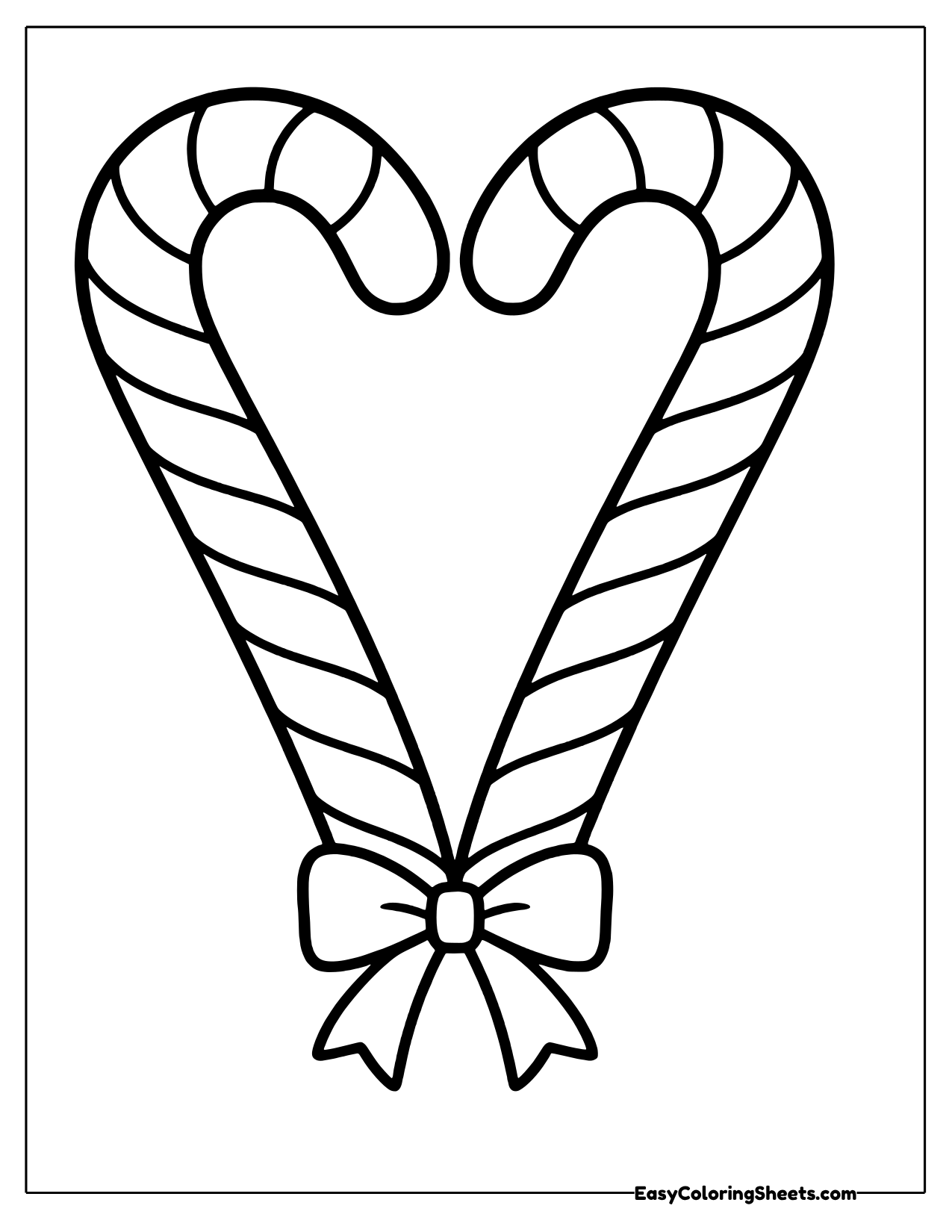 Two candy canes forming a heart with a bow