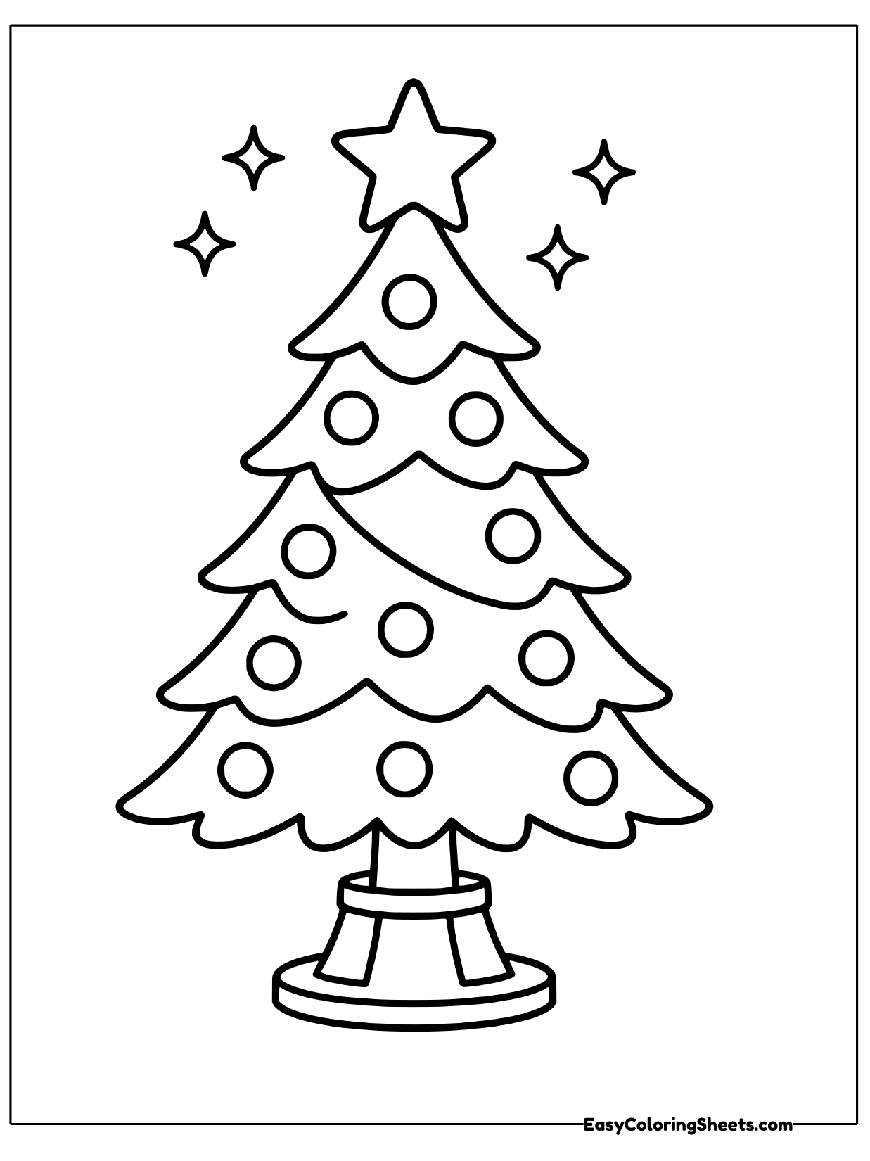 A decorated Christmas tree with round ornaments and garland stands on a small base, topped with a bright star.
