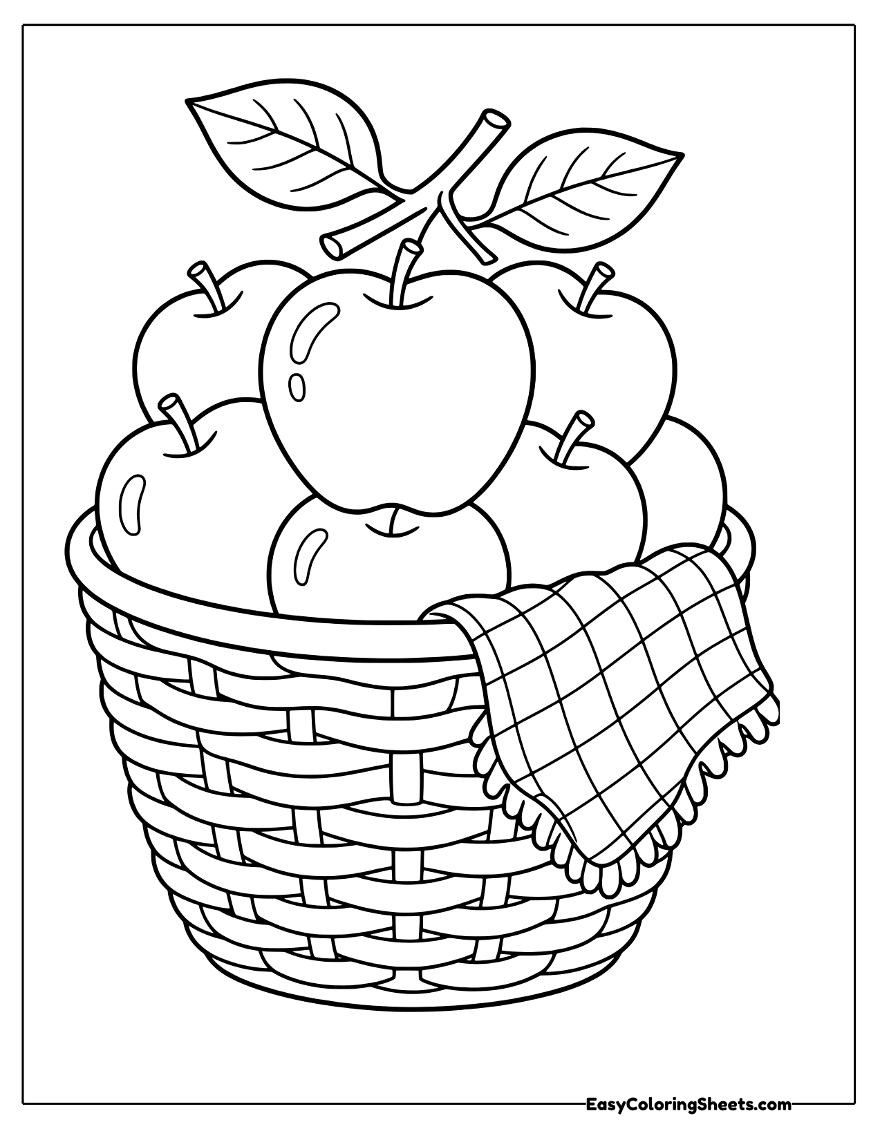 Woven basket full of apples with a checked cloth