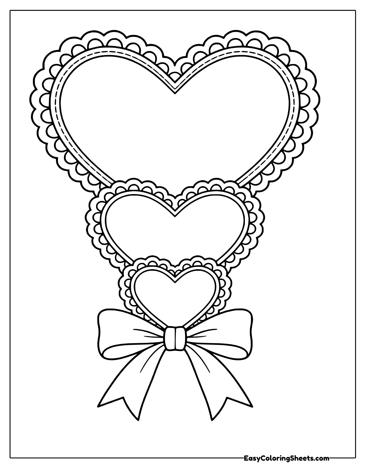 Three stacked lace-edged hearts from large to small tied with a ribbon bow