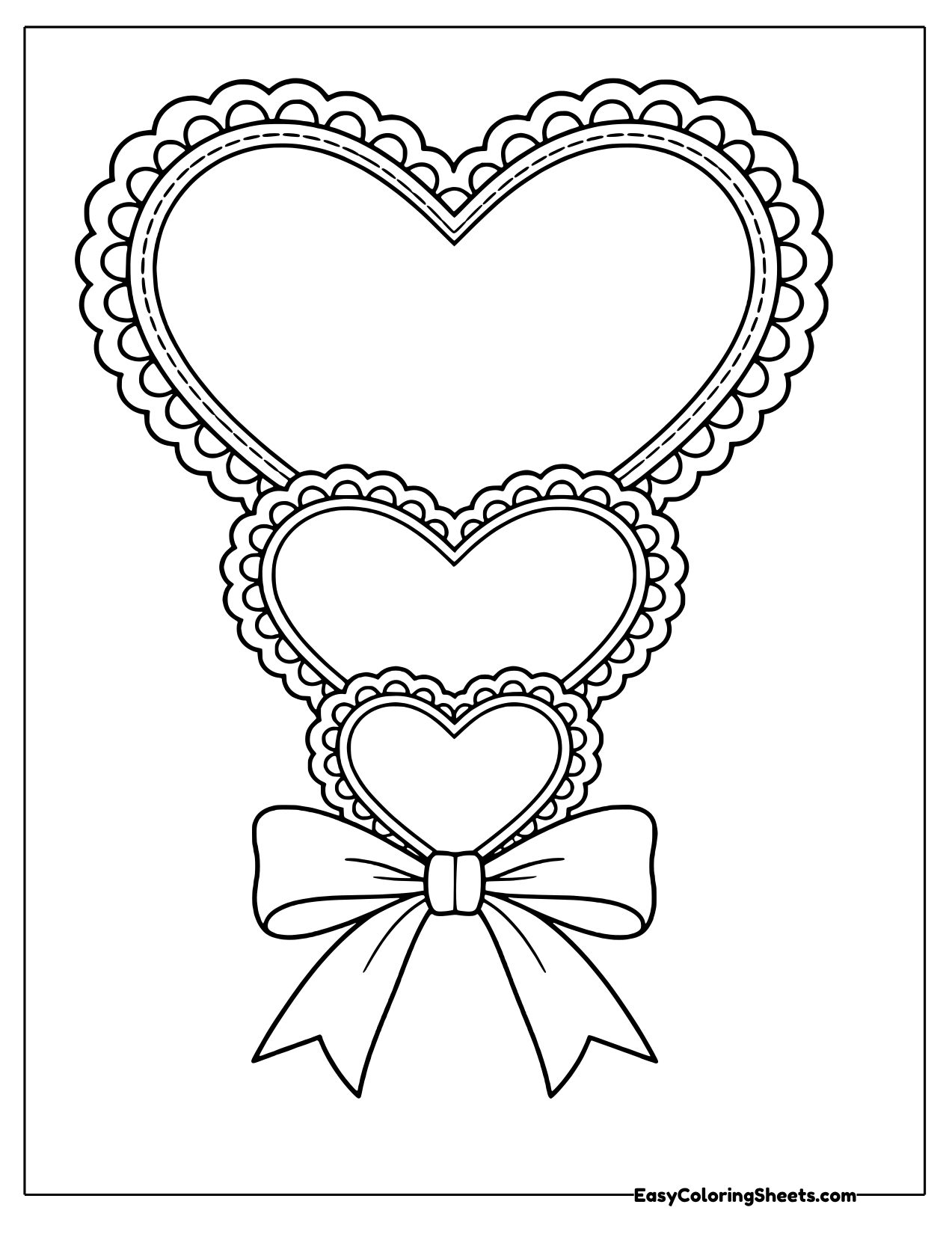 Three stacked lace-edged hearts from large to small tied with a ribbon bow