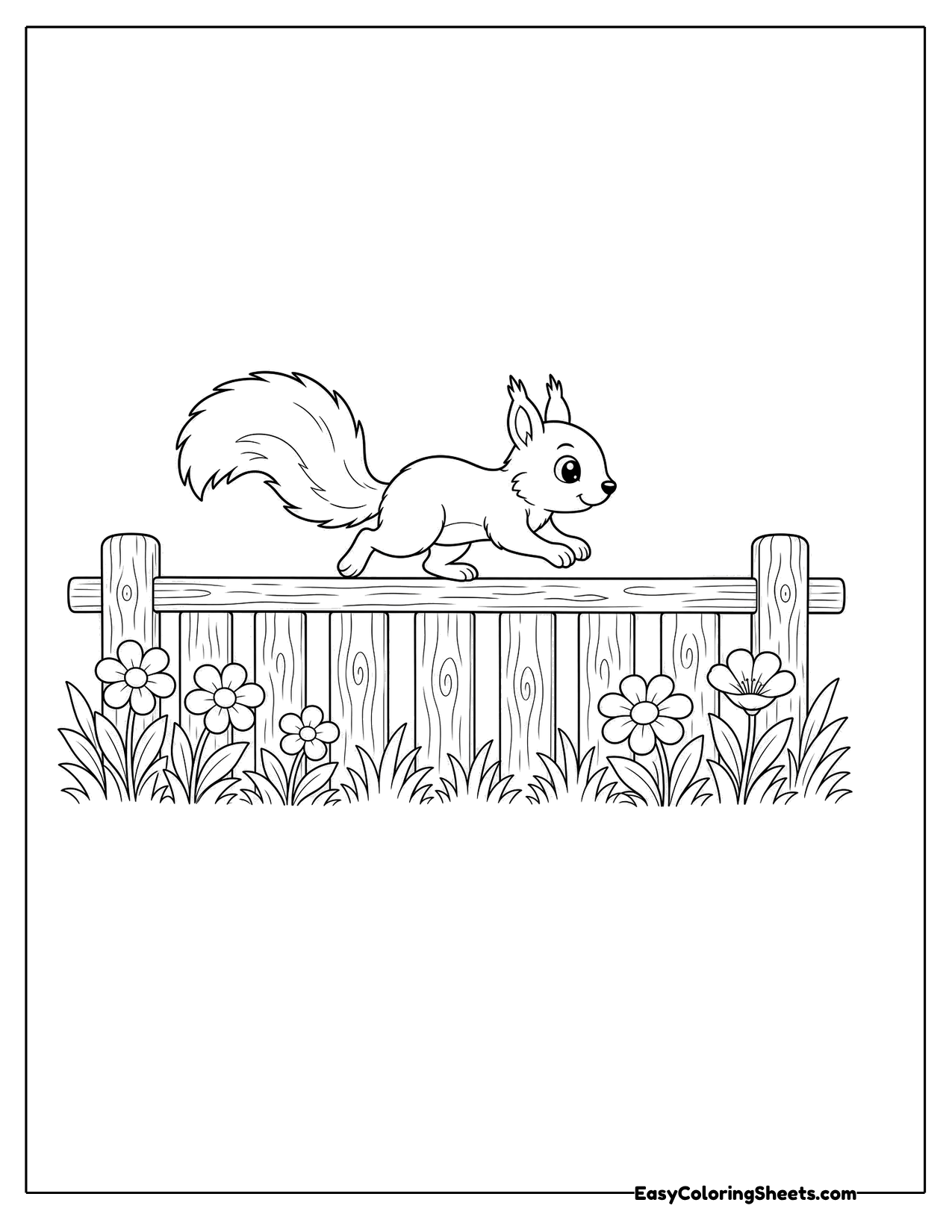 Squirrel running along a wooden fence
