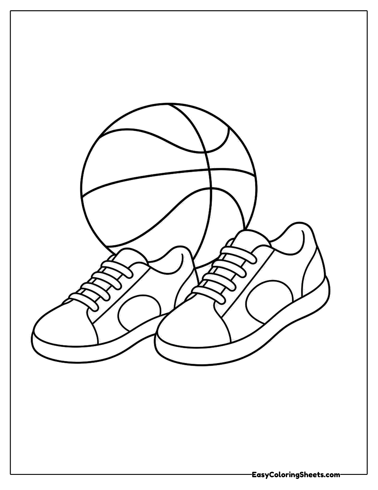 Basketball resting behind a pair of sneakers