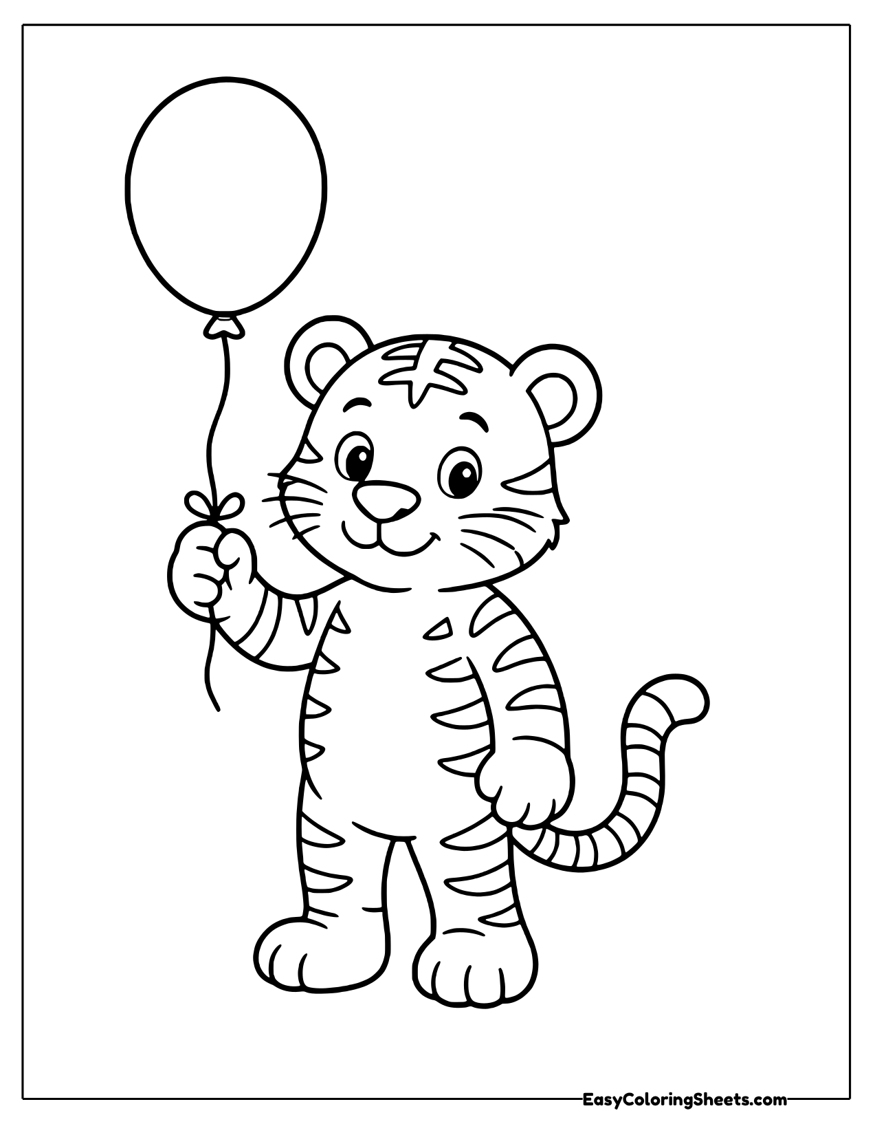 Tiger cub holding a balloon