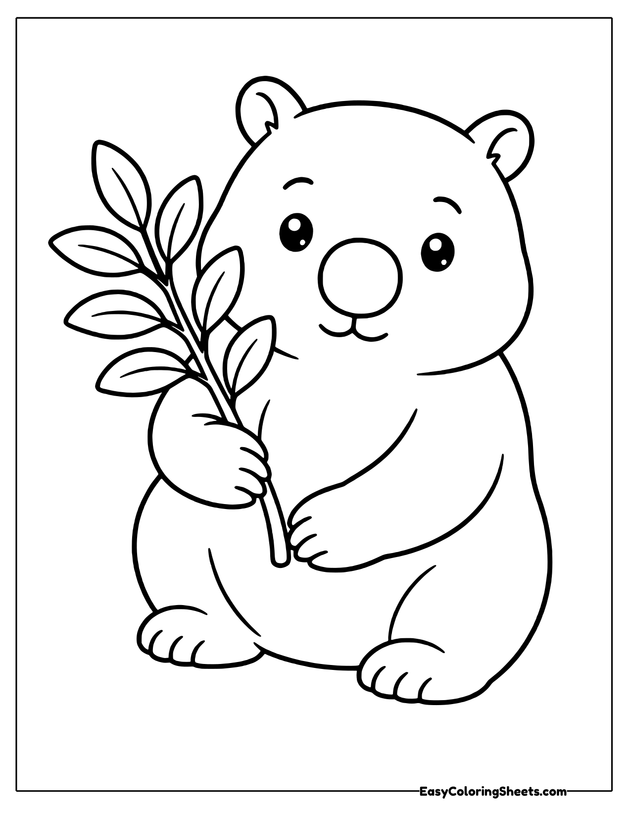 Wombat holding a eucalyptus sprig