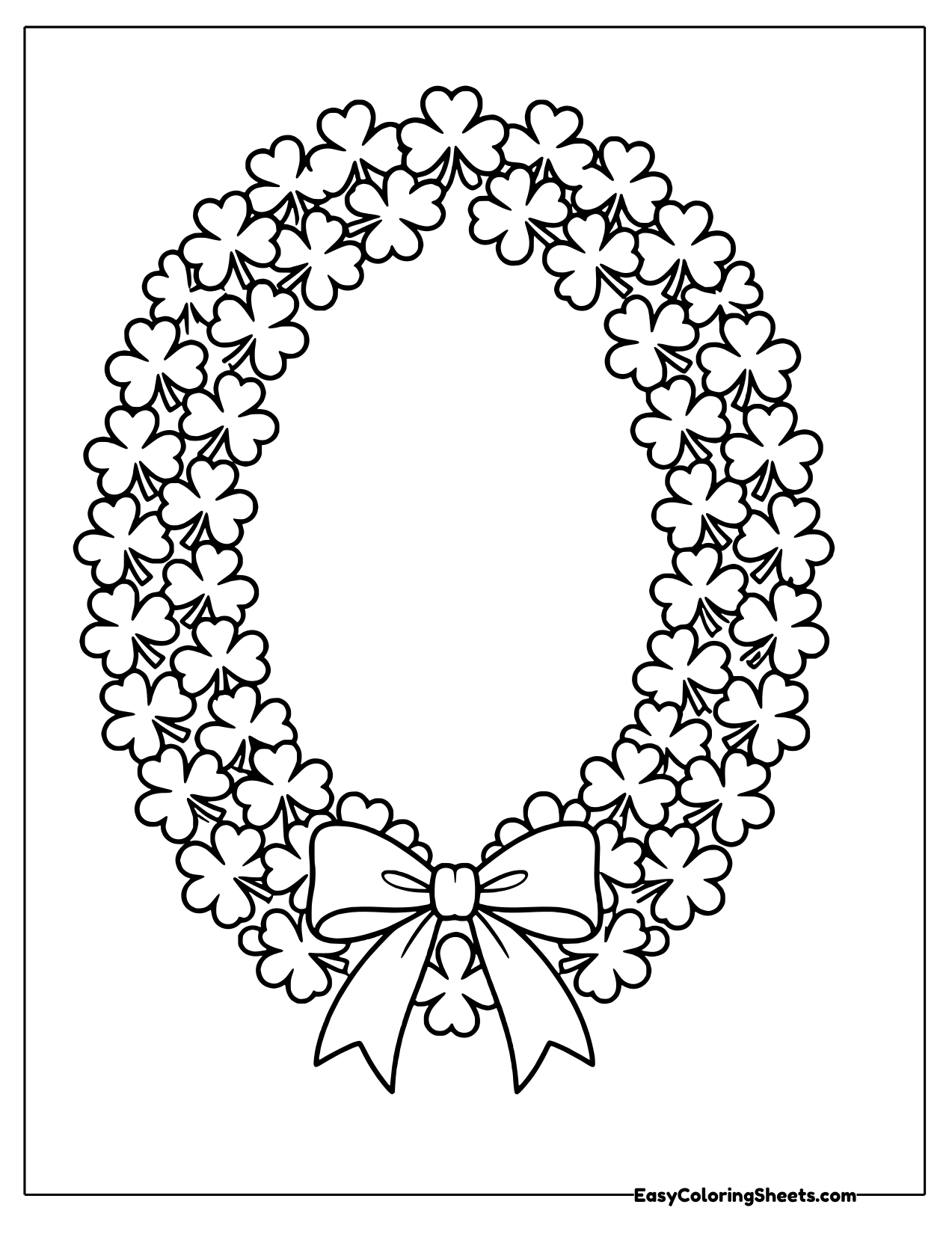 Oval wreath of many shamrocks tied with a ribbon bow