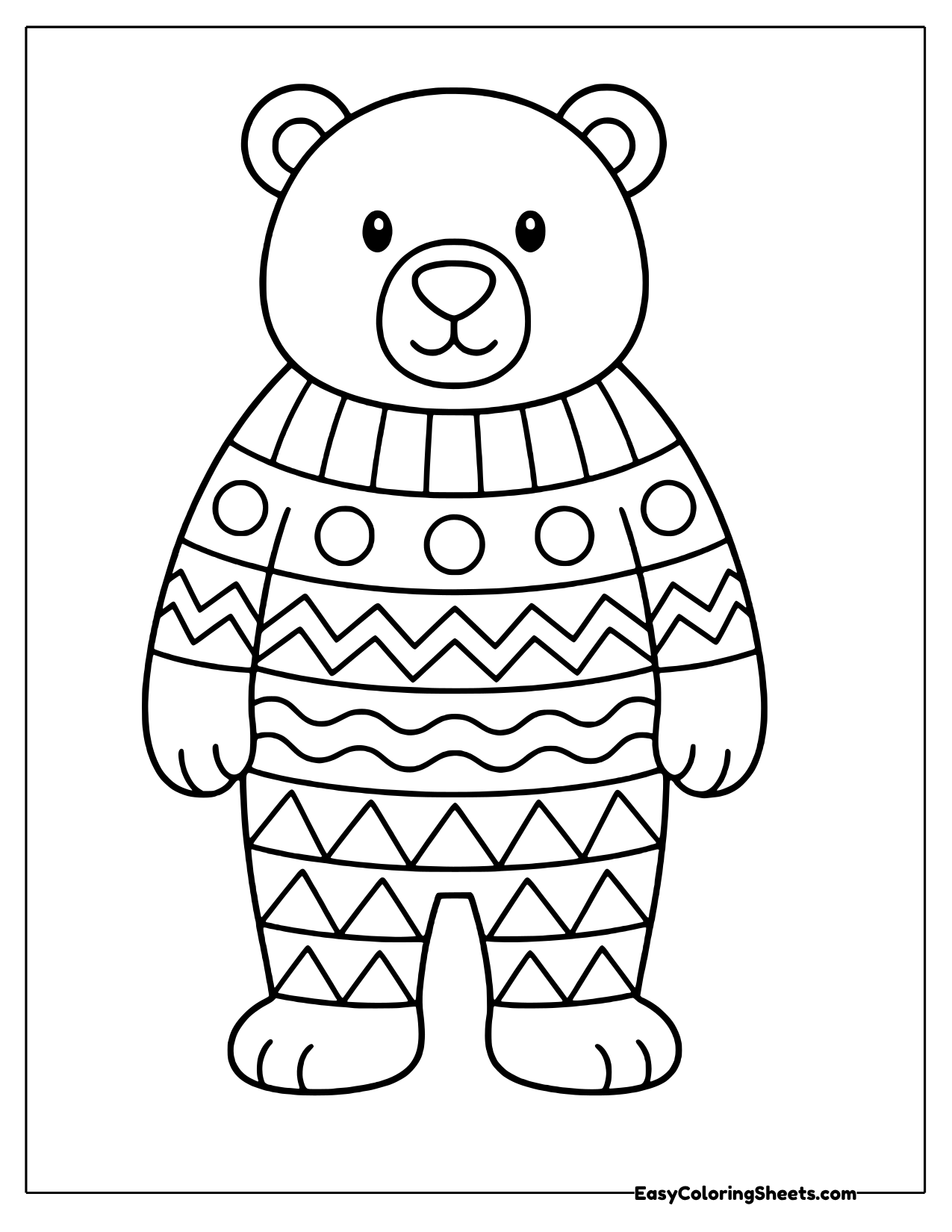 Standing bear wearing a sweater with bands of zigzags, waves, circles and triangles