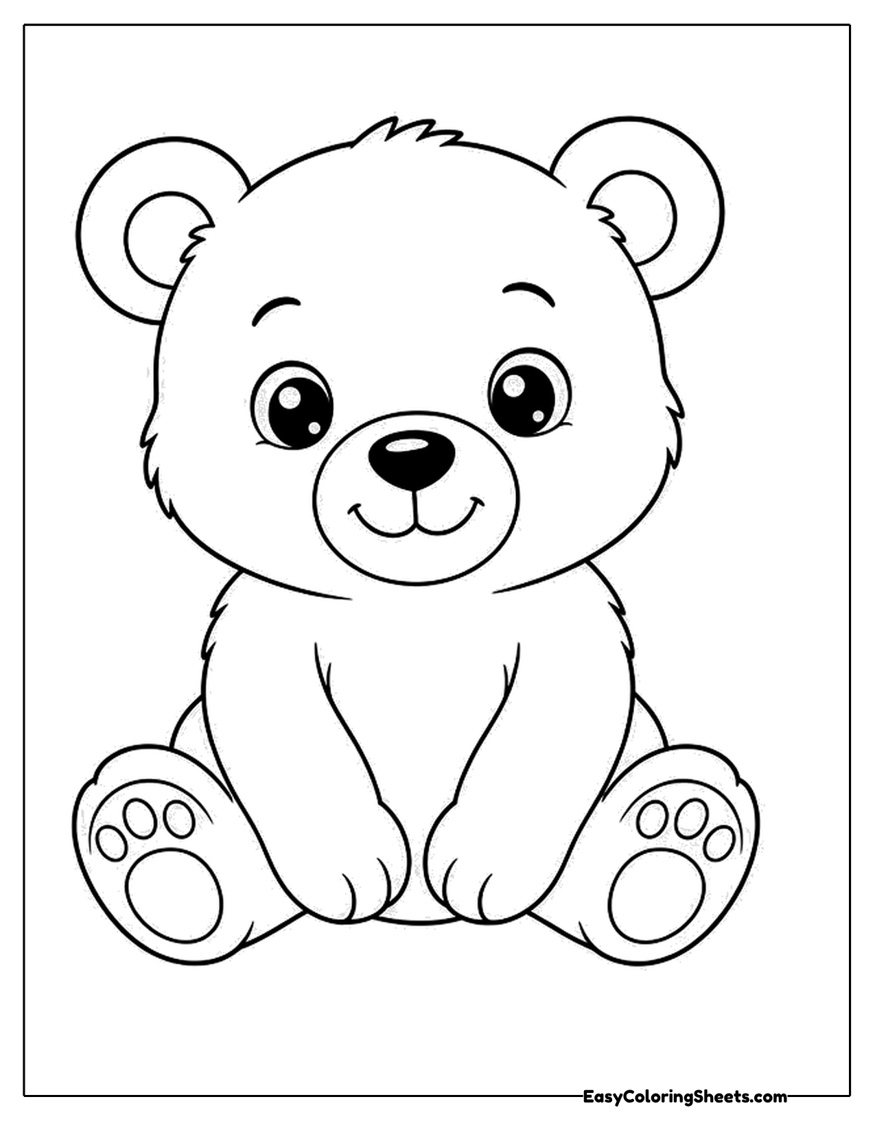 Cute baby bear sitting with feet forward