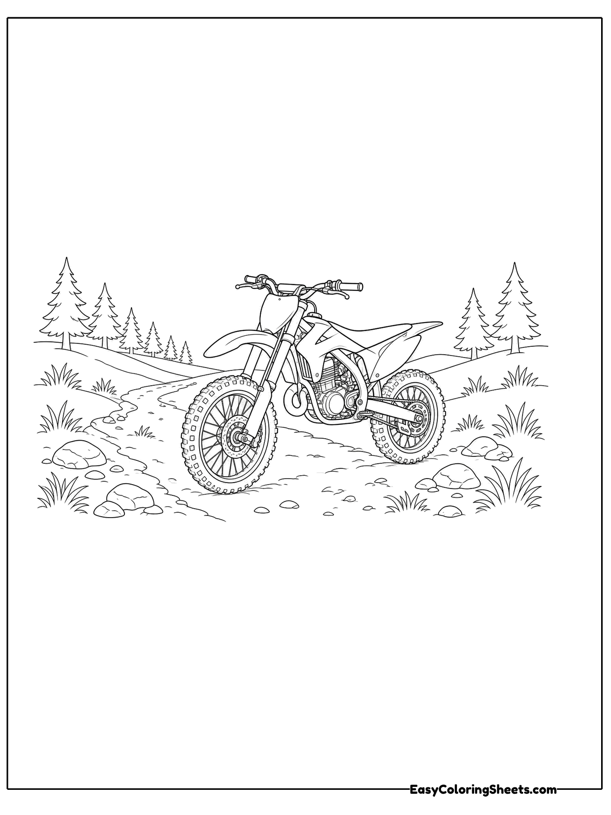 A dirt bike stands on a winding dirt trail with pine trees, rocks and hills around it.