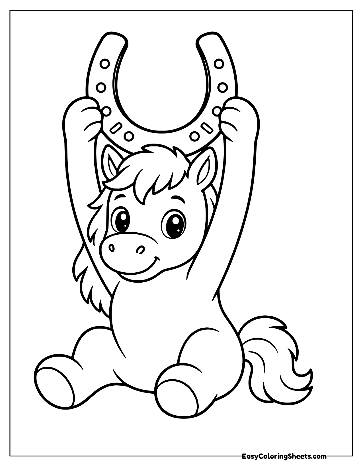 Smiling pony sitting and holding a horseshoe up over its head