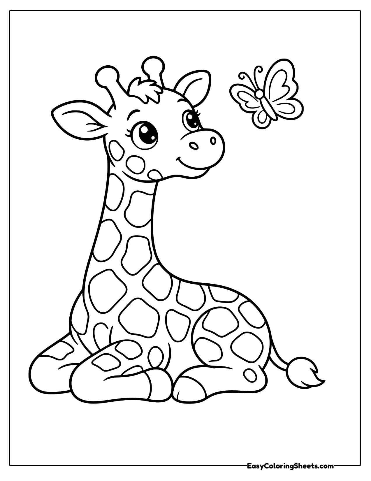 Baby giraffe lying down with a butterfly floating nearby
