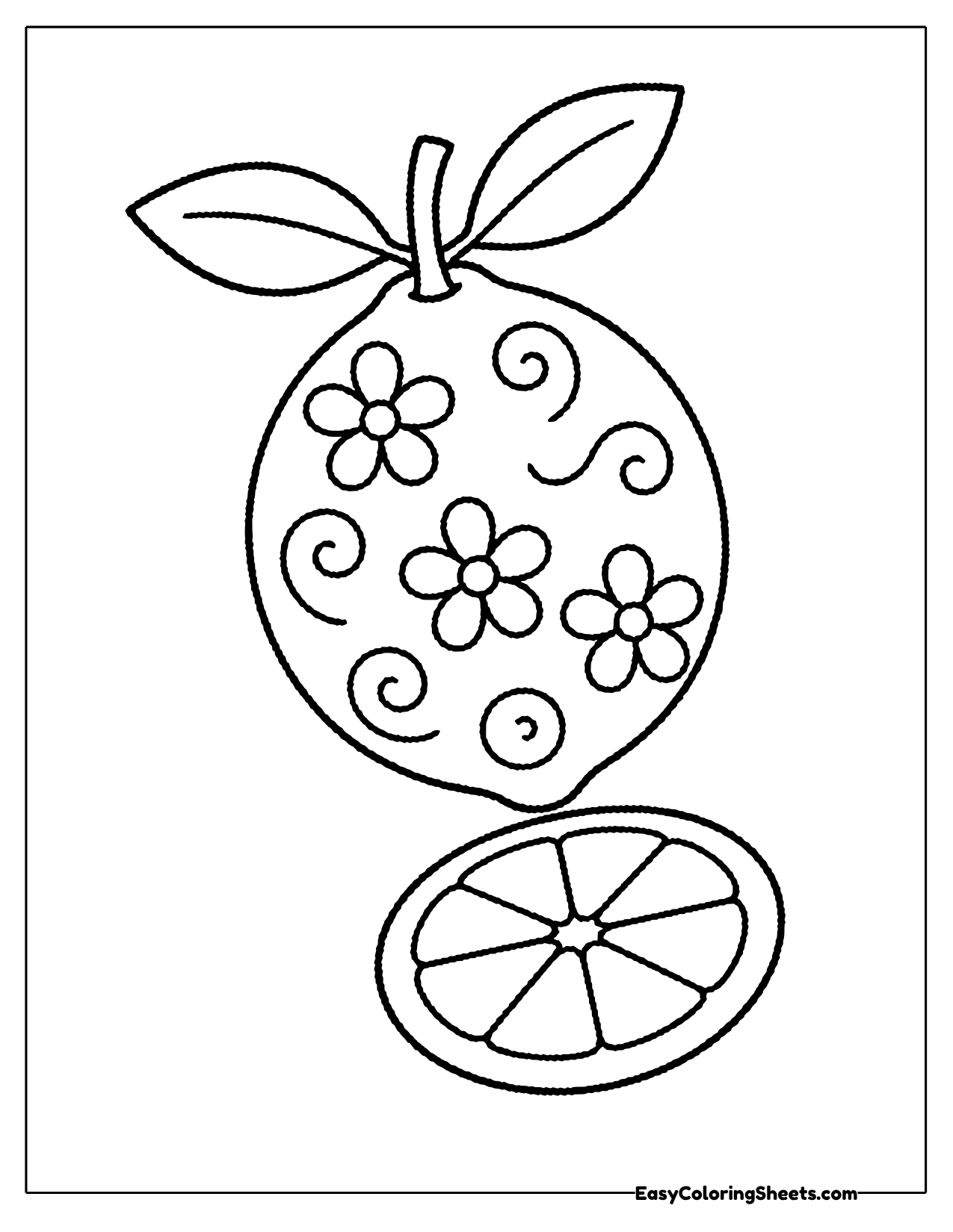Lemon decorated with flowers and swirls beside a slice