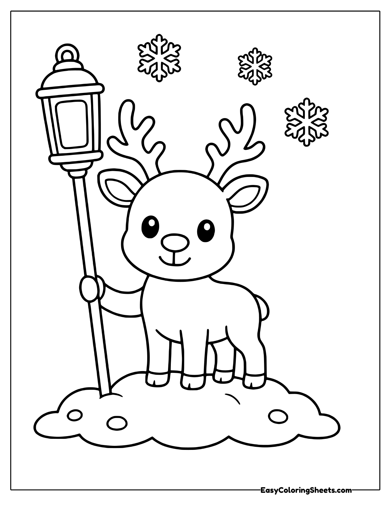 Reindeer next to a street lamp