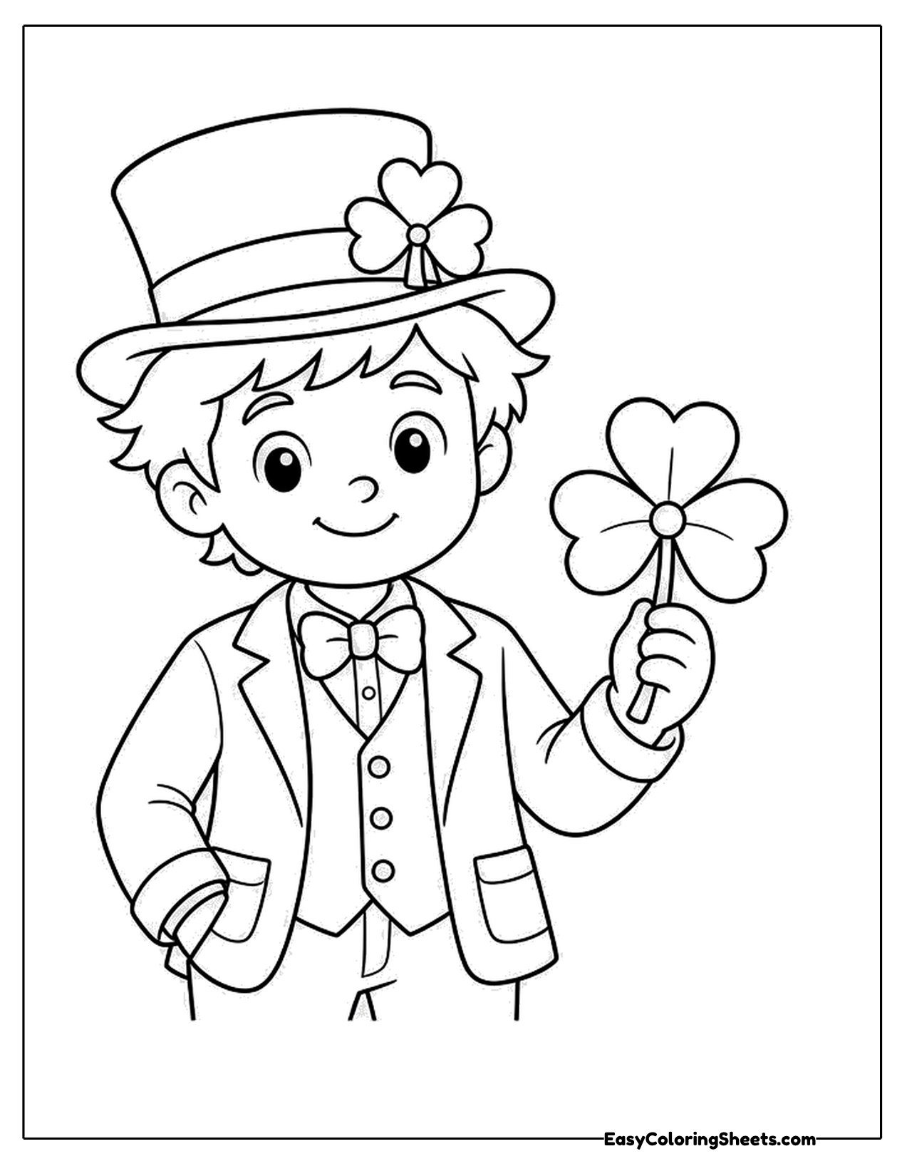 Boy in a top hat holding a shamrock