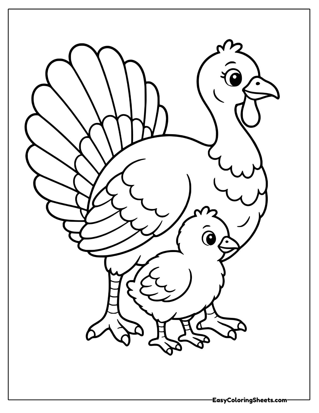 Mother turkey standing beside a small turkey chick