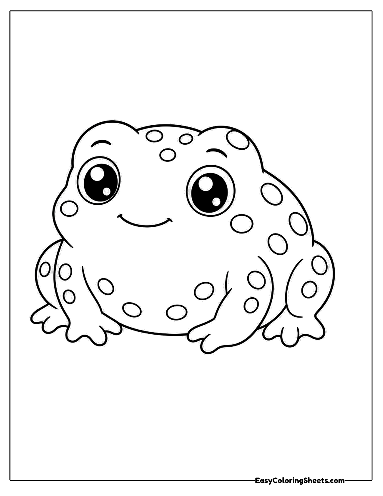 Baby toad with spots and big eyes