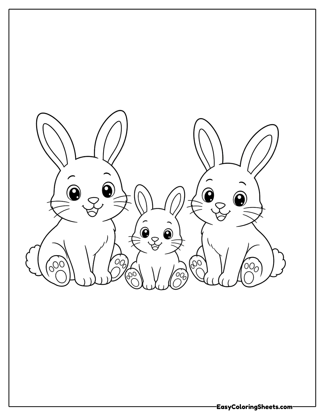 Two adult rabbits sitting with a small baby bunny between them