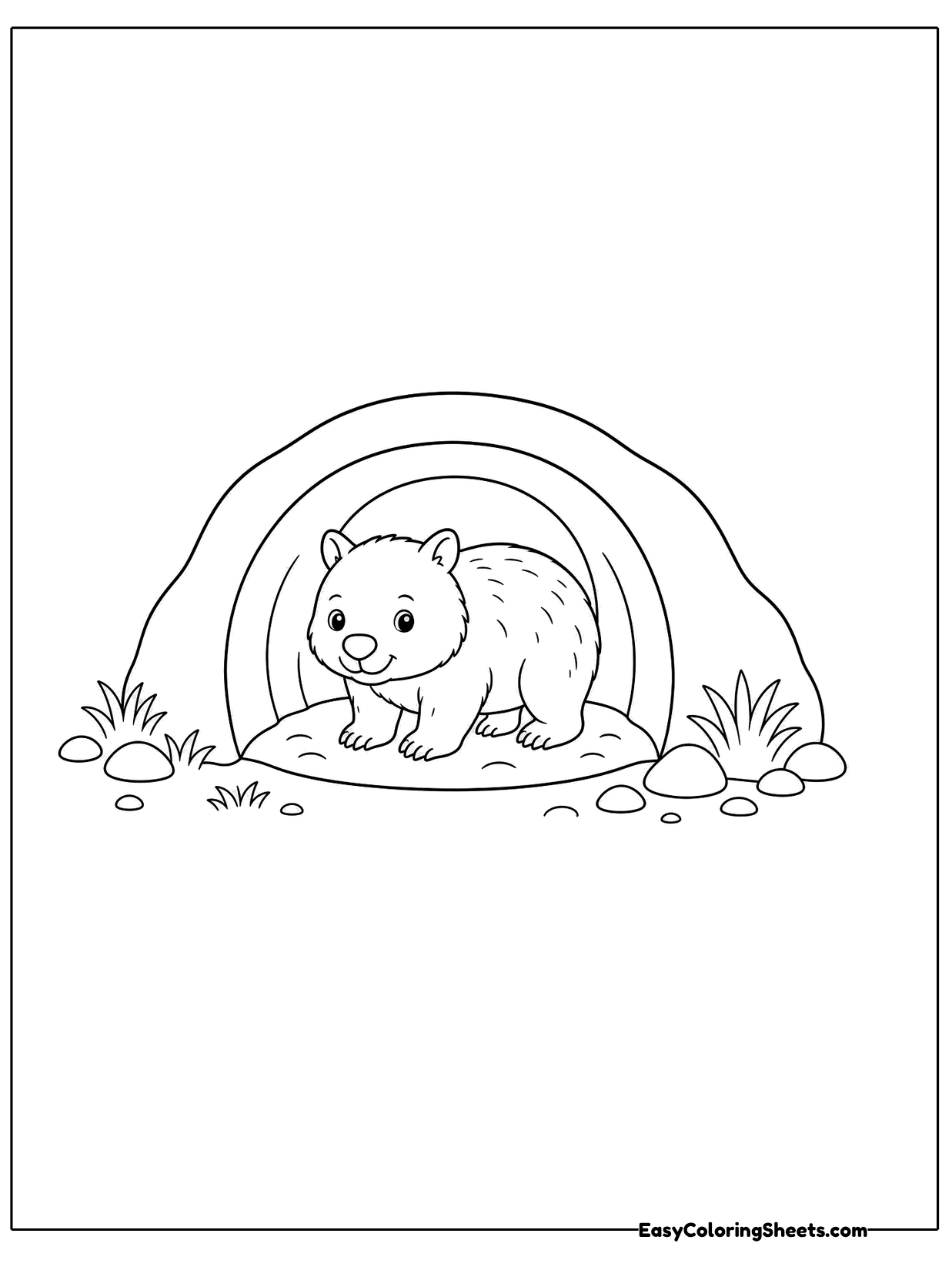 A wombat peeks out from a round burrow.