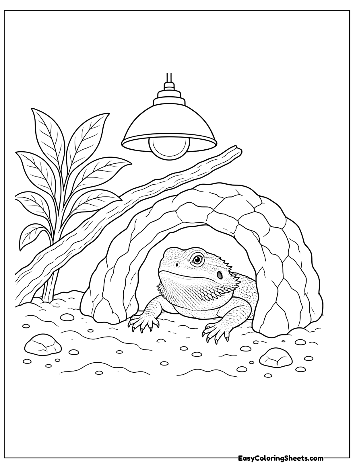 A bearded dragon peeks out of a rocky cave hideout under a heat lamp, with plants around it.