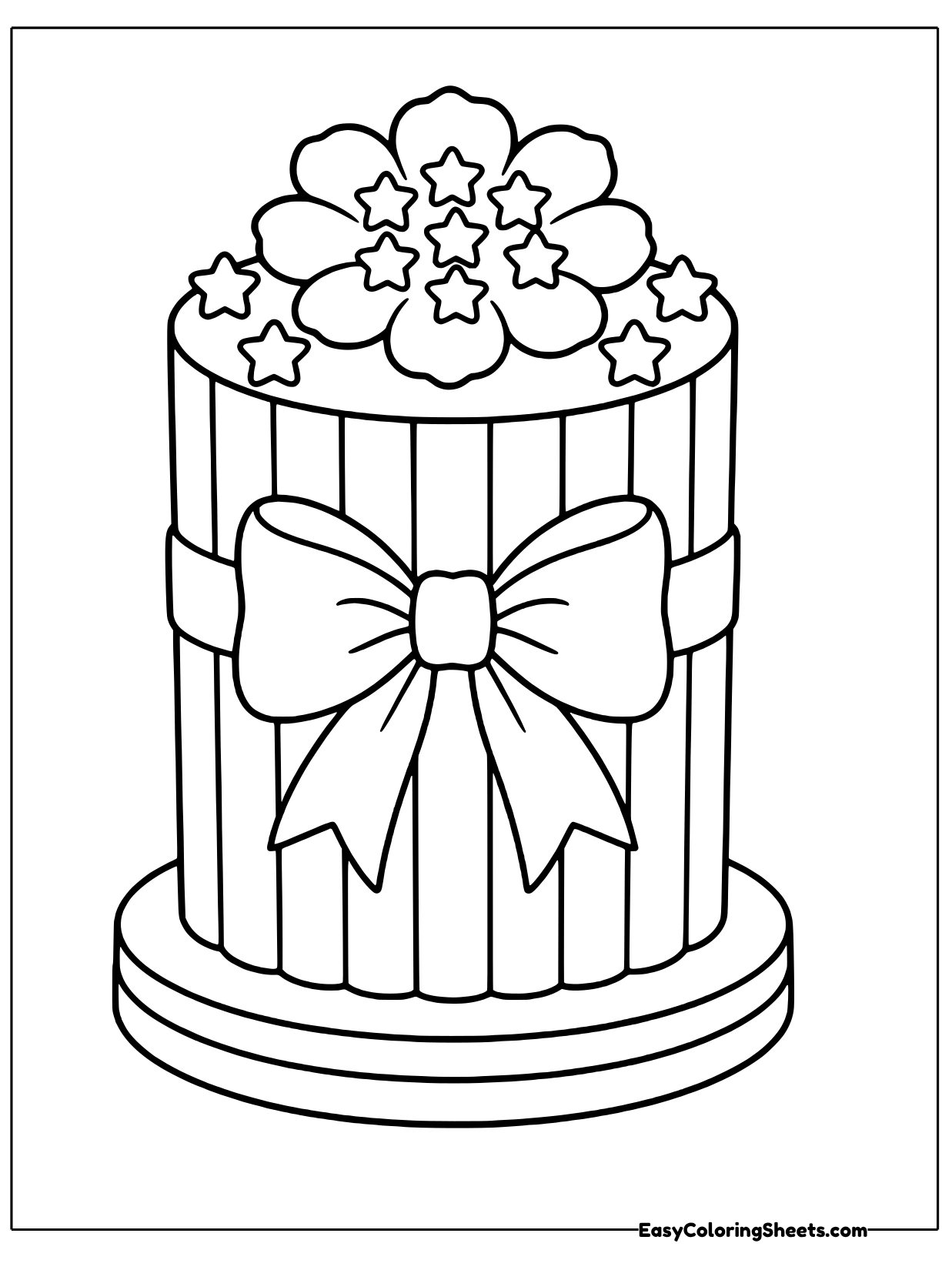 A tall round pillar cake wrapped in striped fondant has a big bow on the front and flowers piled on top.