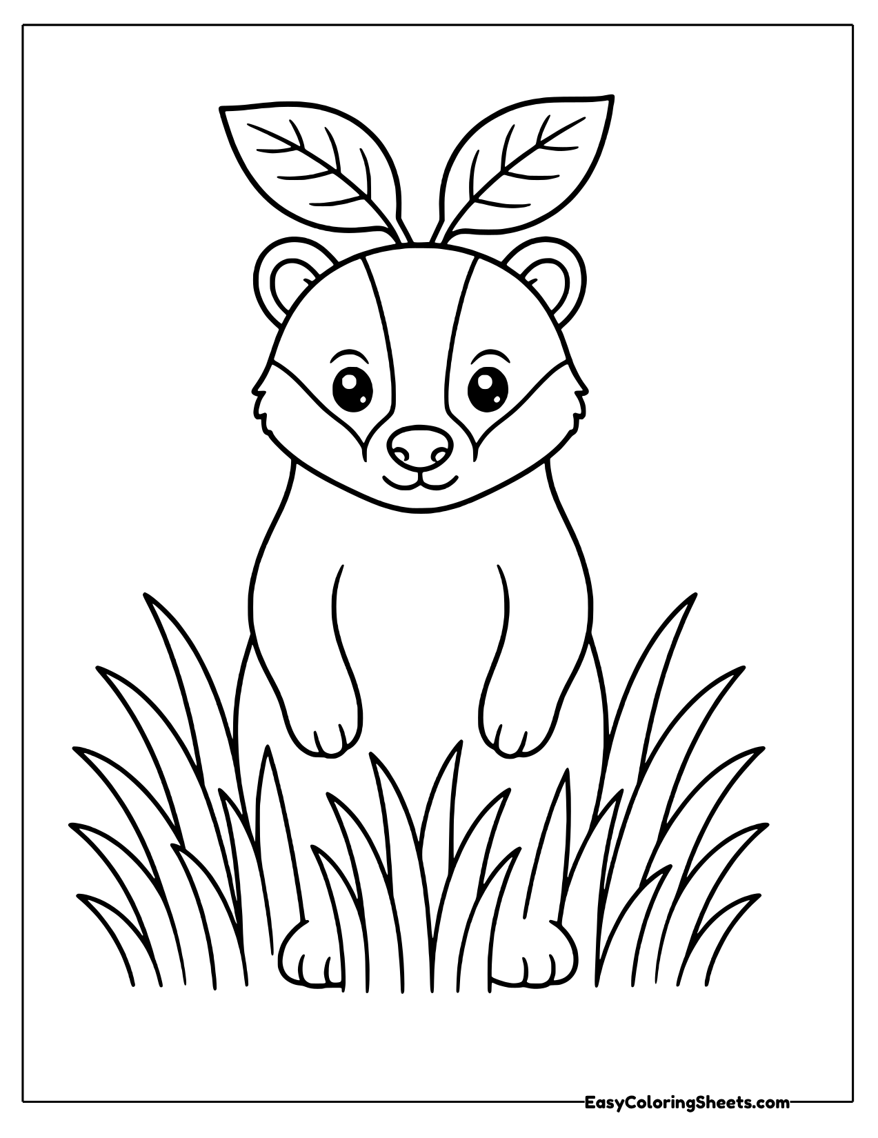 Badger standing in tall grass