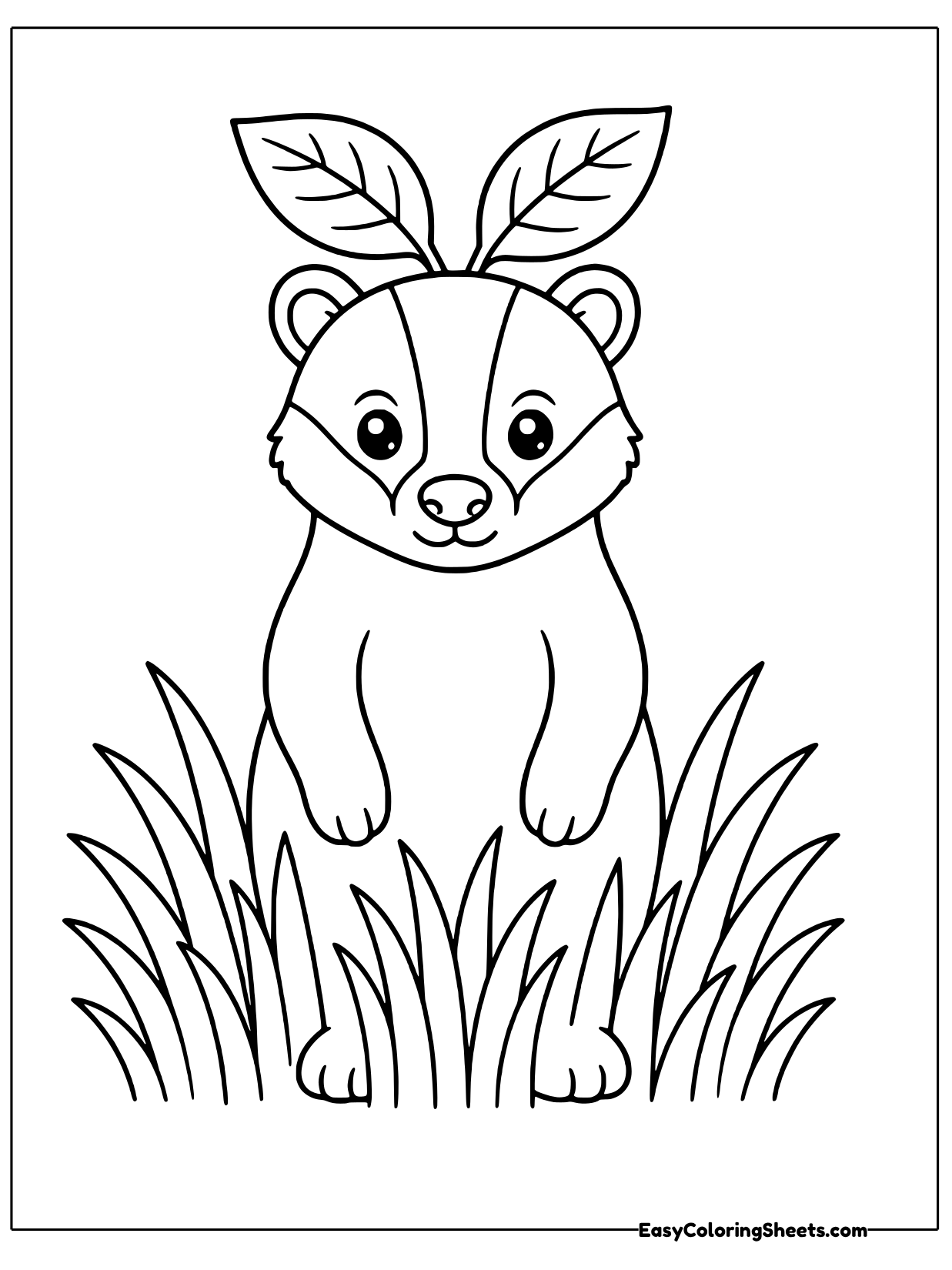 A badger stands in tall grass with leafy sprouts on its head, looking straight ahead.