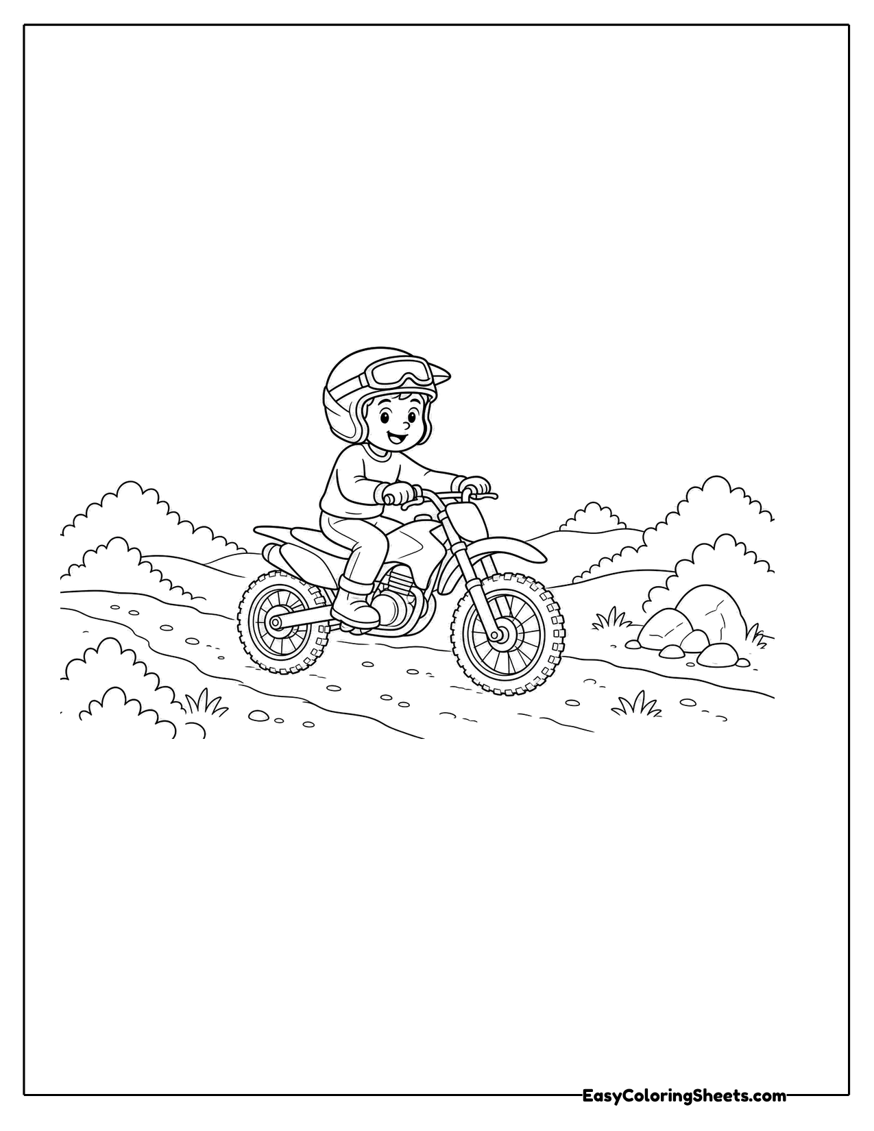 Kid riding a dirt bike on a trail