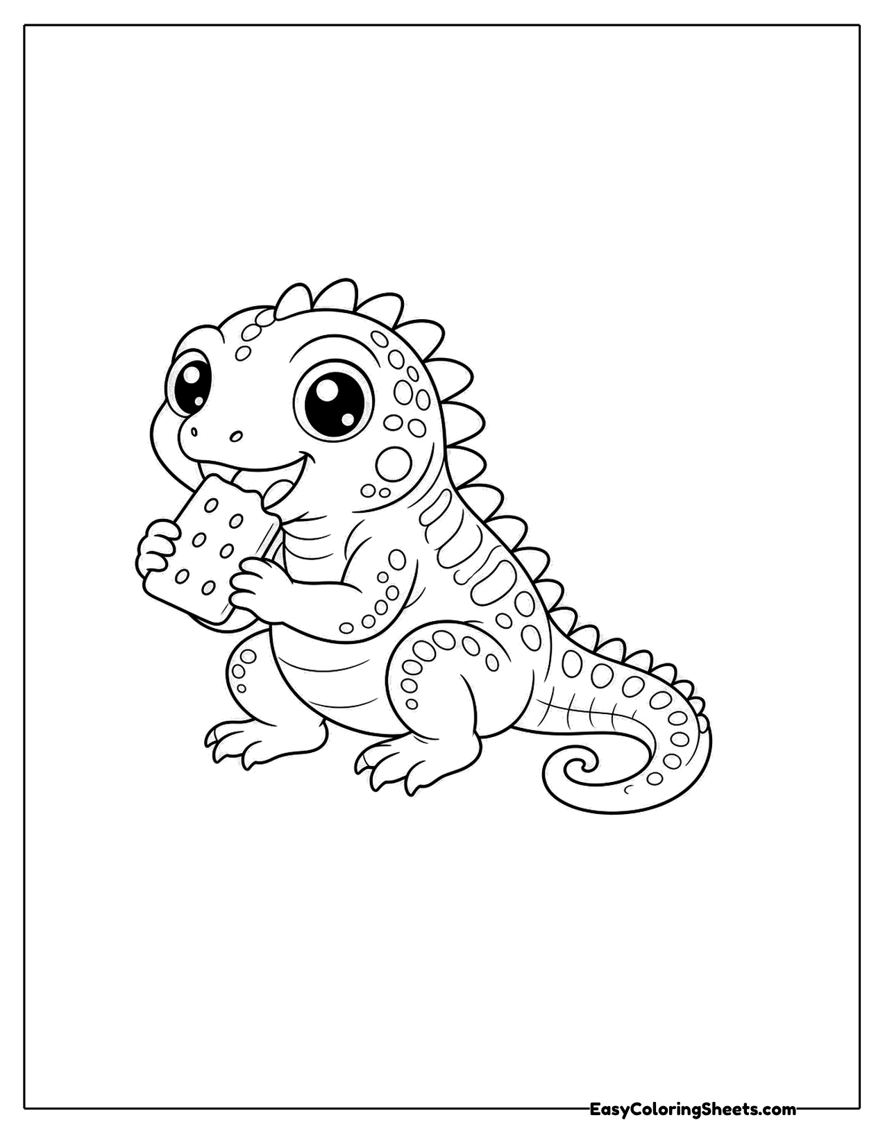 Iguana nibbling on a cracker