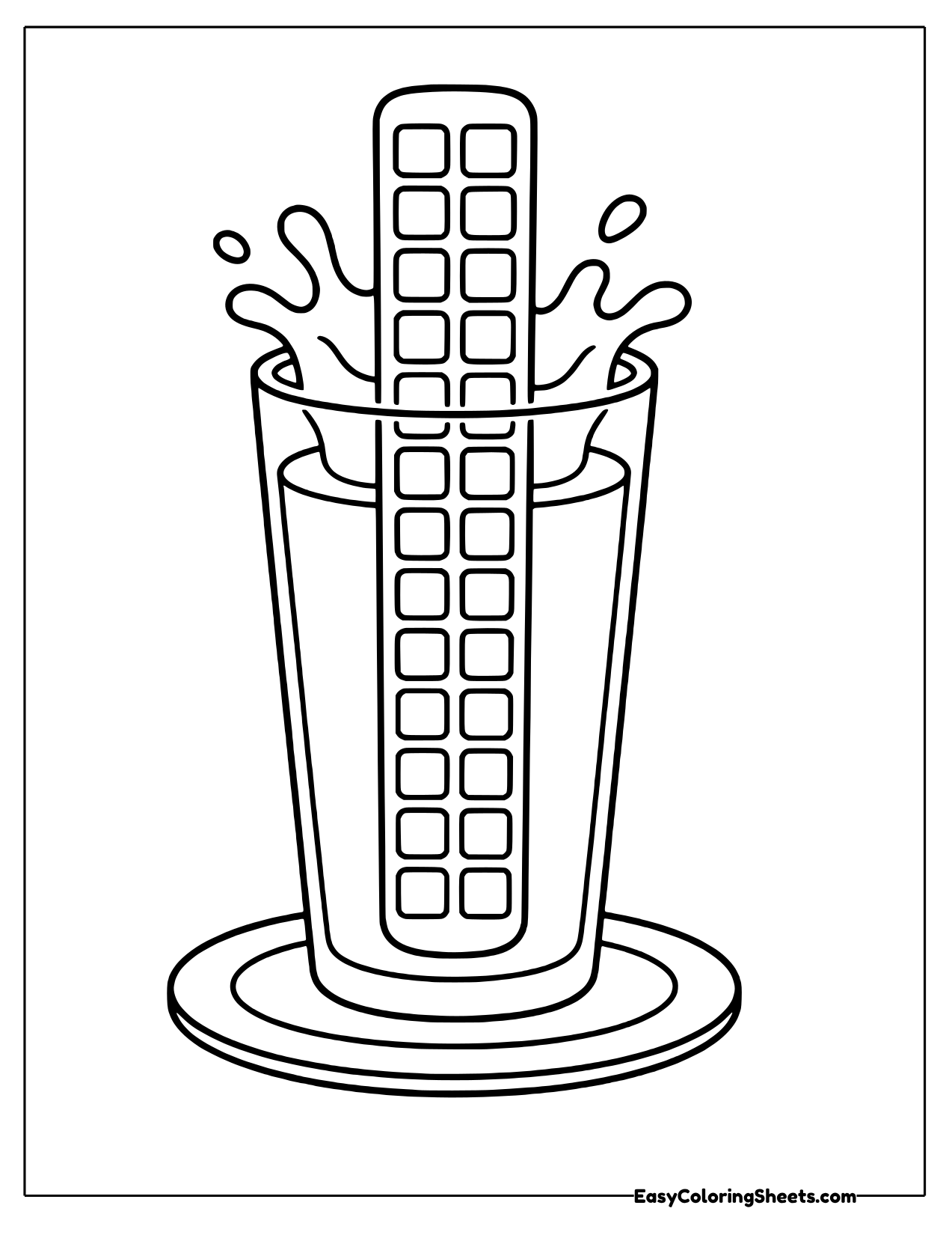 Wafer stick dunked in a splashing glass of milk