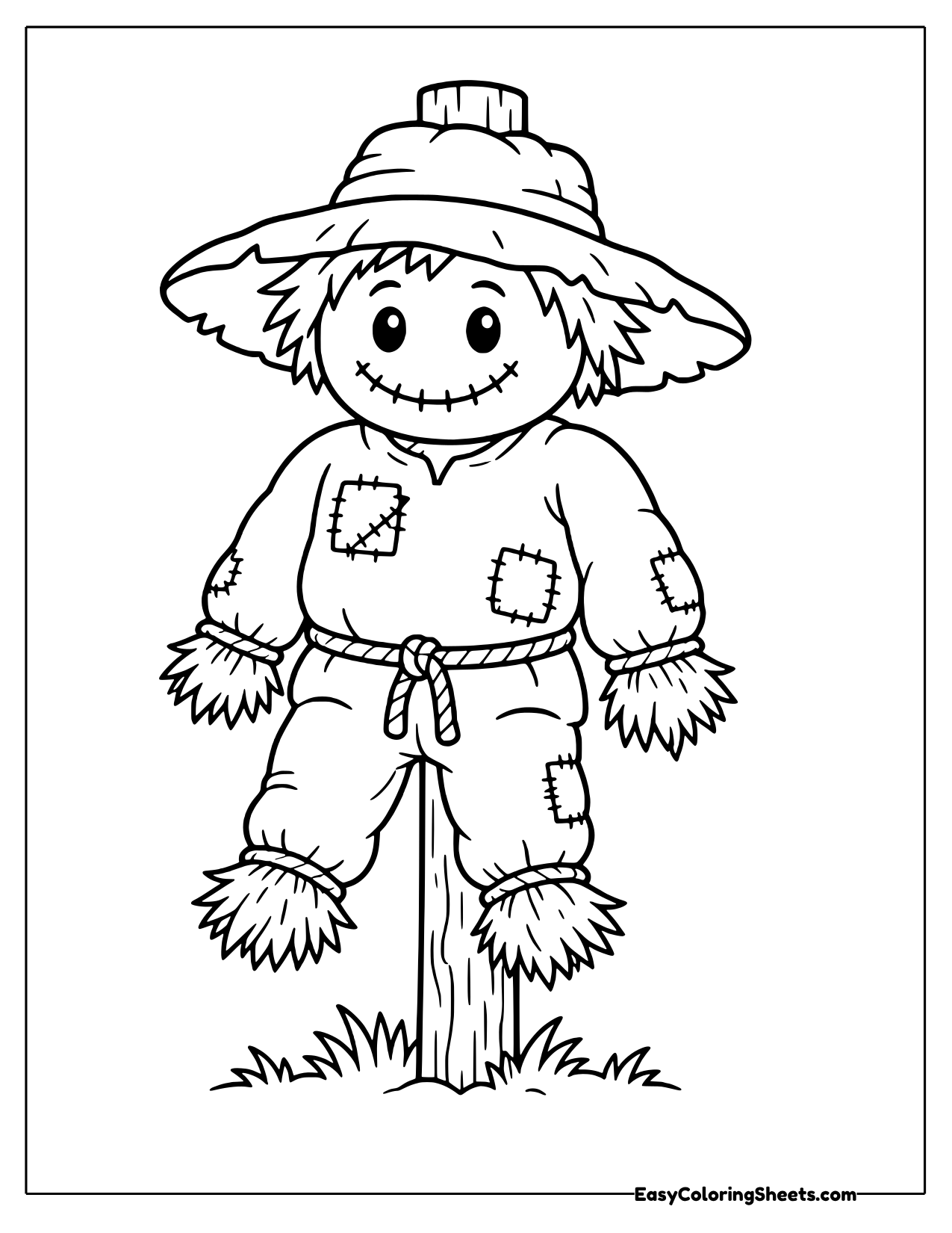Mounted on a tall wooden post, this scarecrow wears a wide straw hat, a patched shirt and a rope belt.