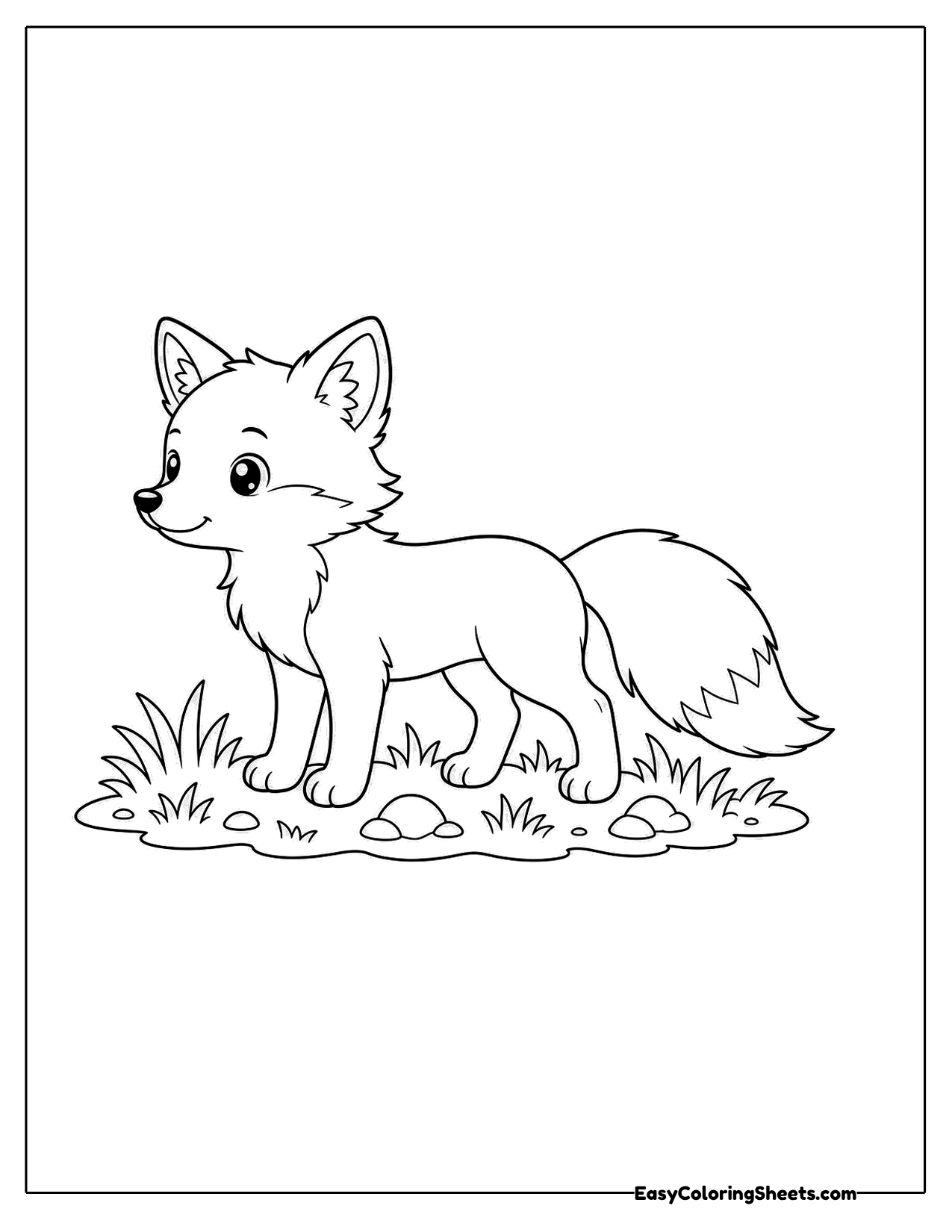 Fox standing on a patch of grass and small flowers