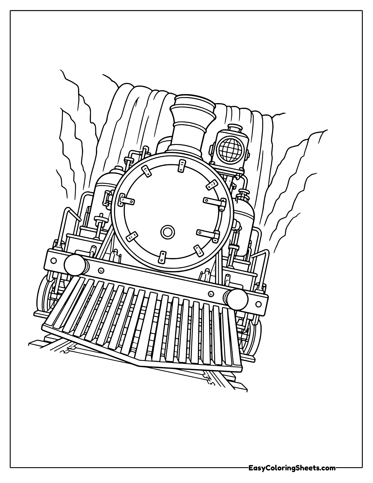 Front view of a steam locomotive with a waterfall pouring down cliffs behind it