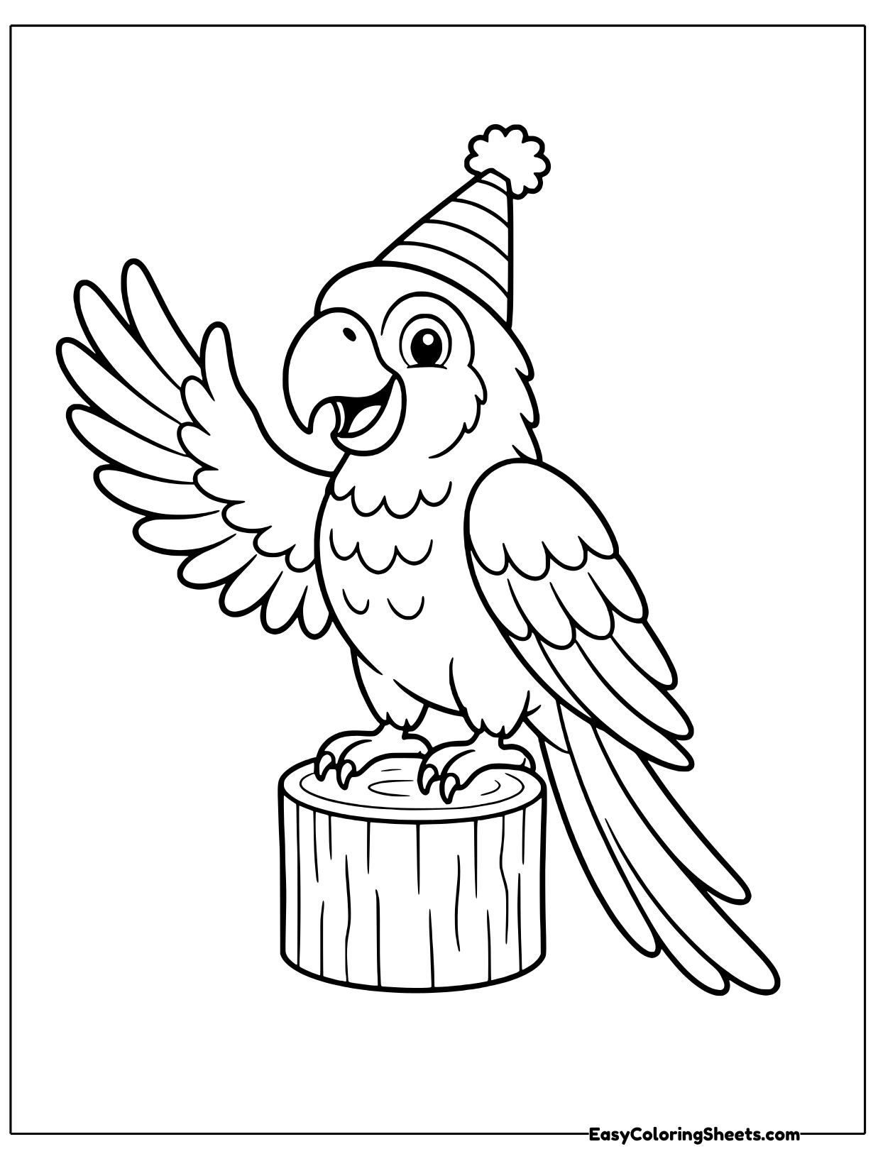 A happy macaw wears a pointed party hat with a pom pom on top while standing on a tree stump.