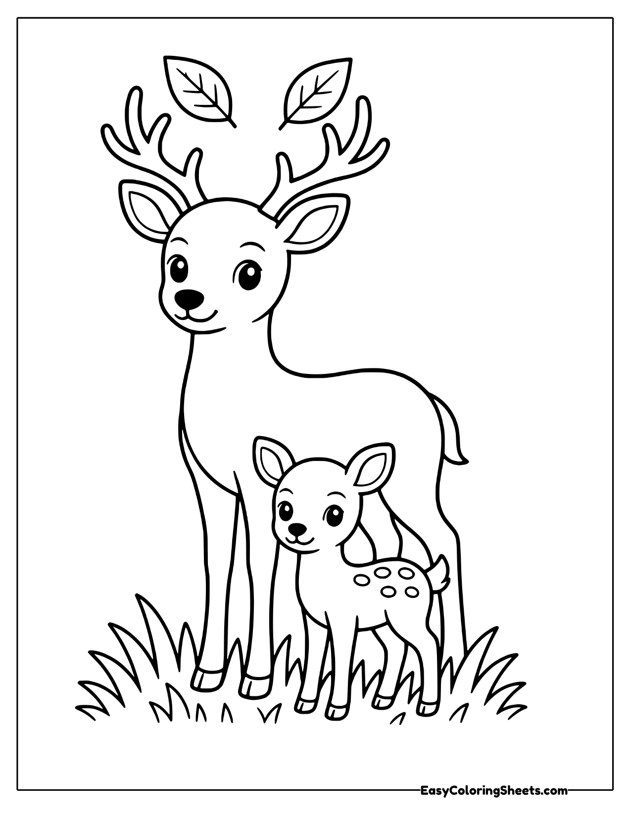 Fawn standing with its parent