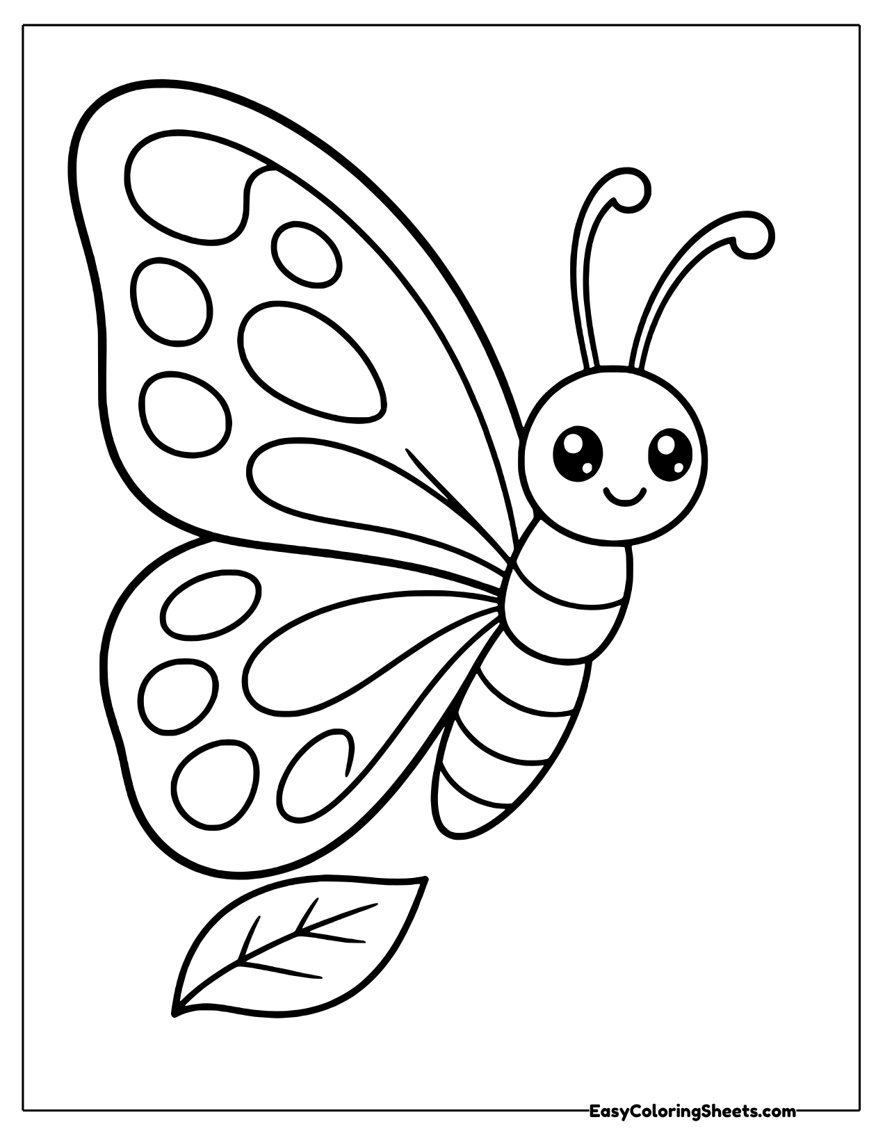 Butterfly in side profile above a leaf