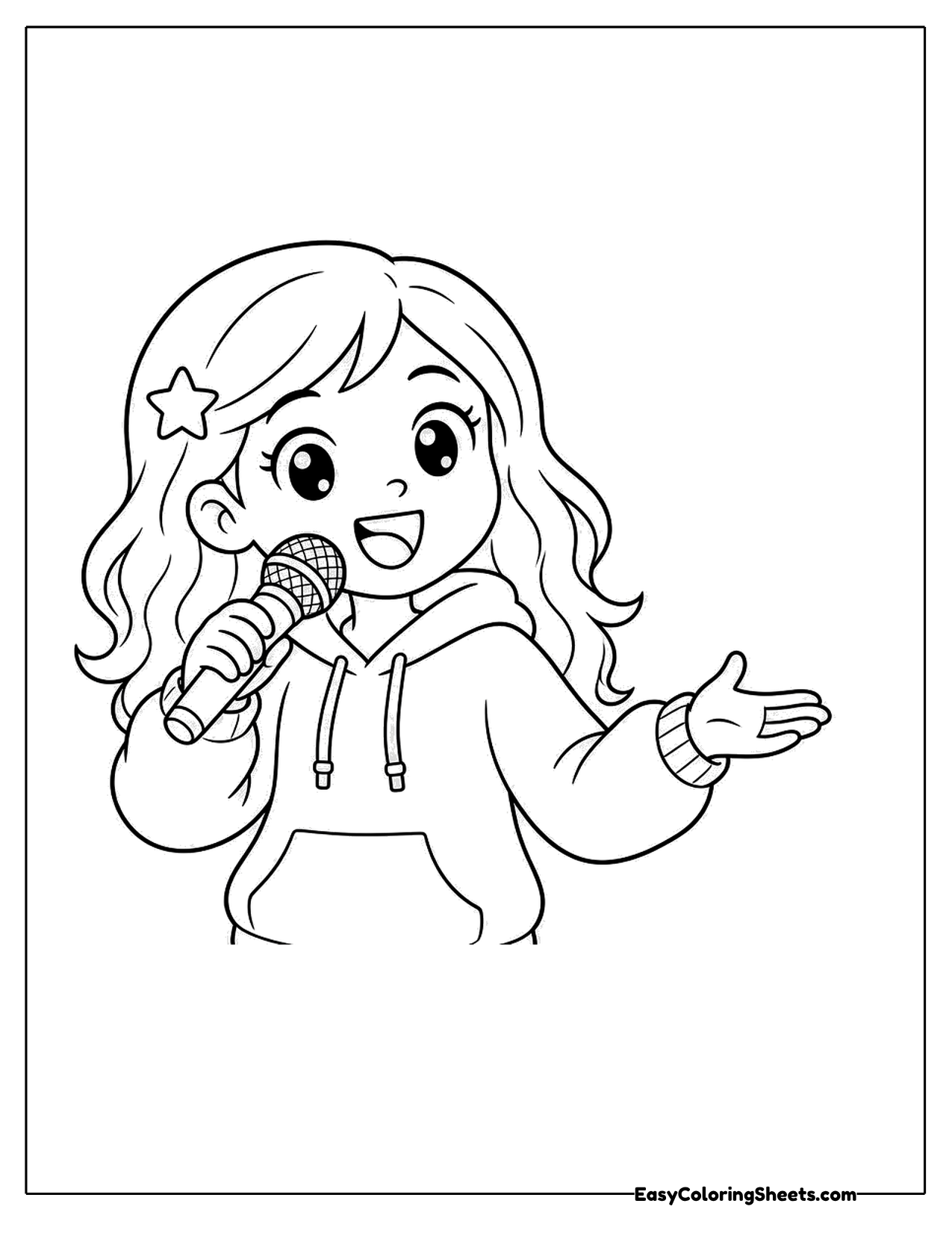 Singer in a hoodie holding a microphone