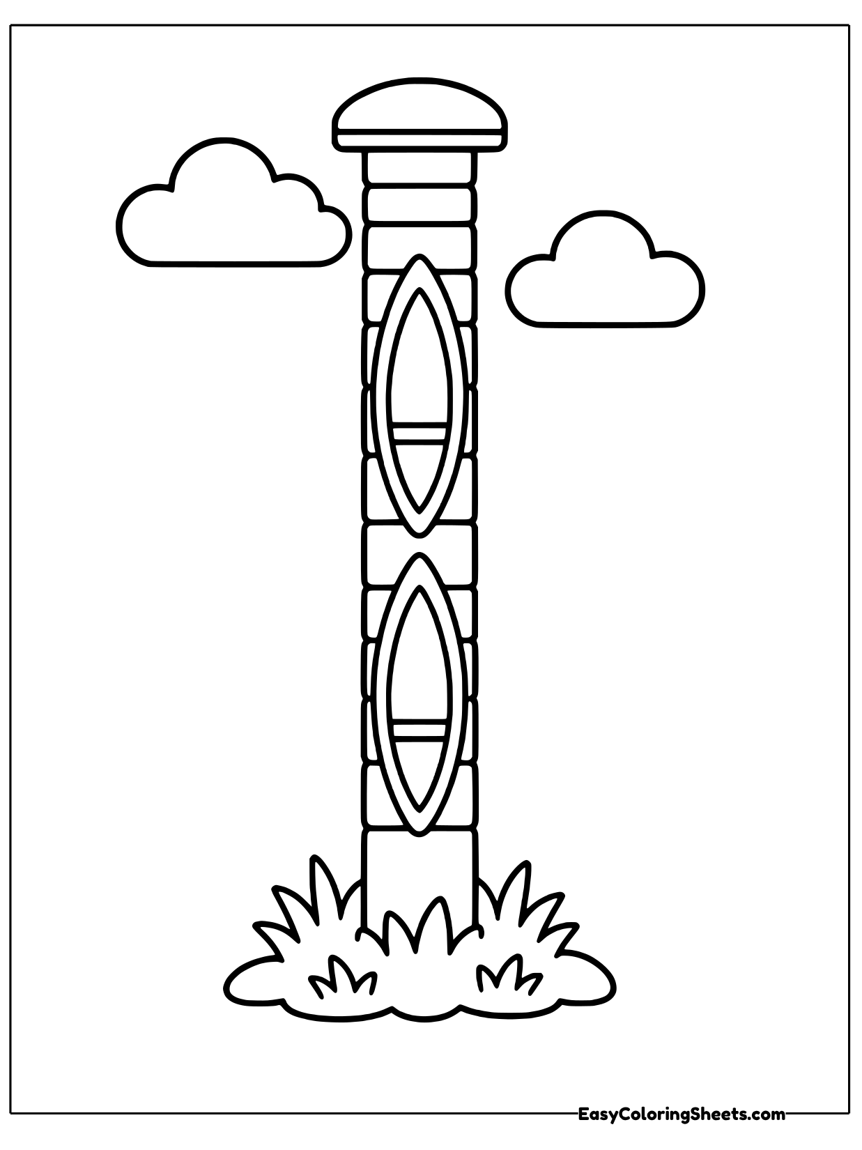 Two canoes are stored one above the other on a tall post rack standing in the grass.