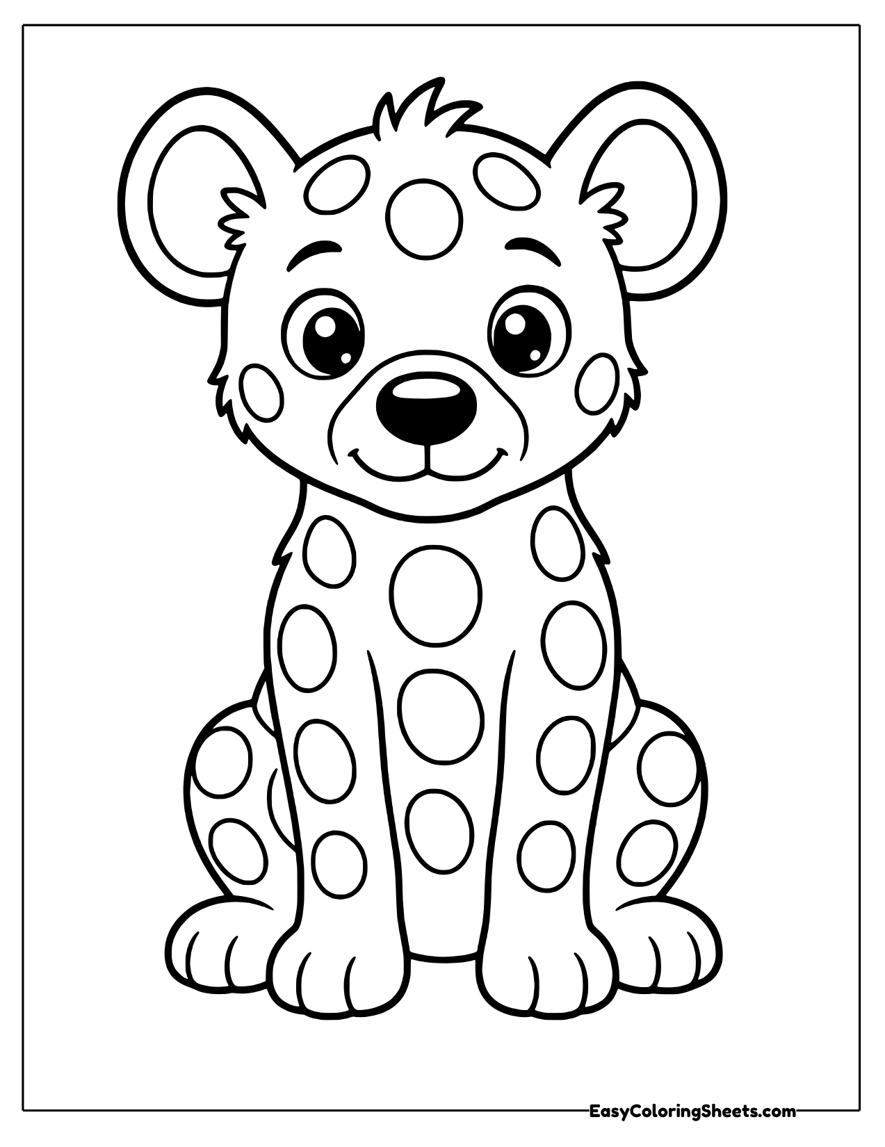 Easy spotted hyena cub facing forward