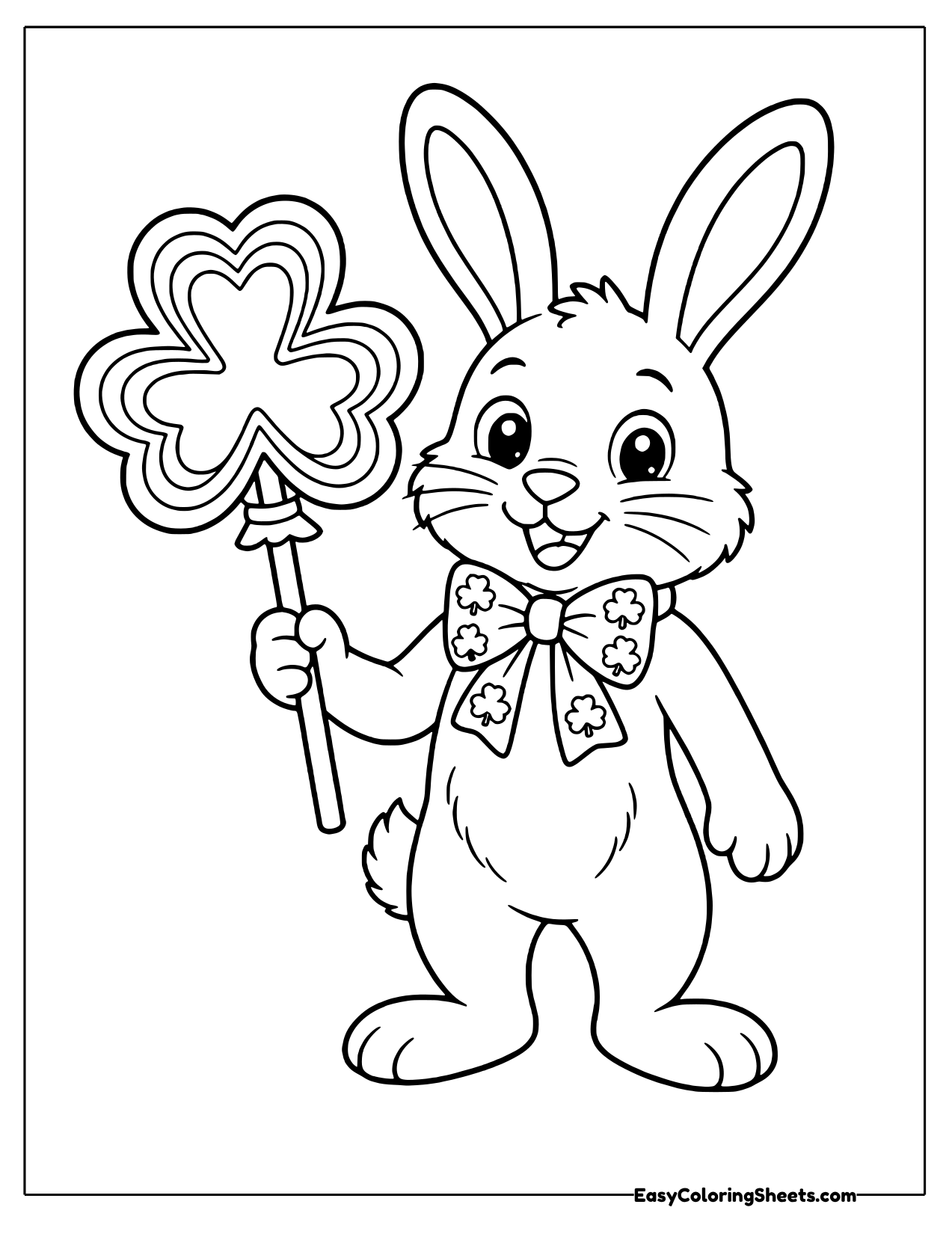 Smiling bunny in a clover bow tie holding a shamrock shaped lollipop