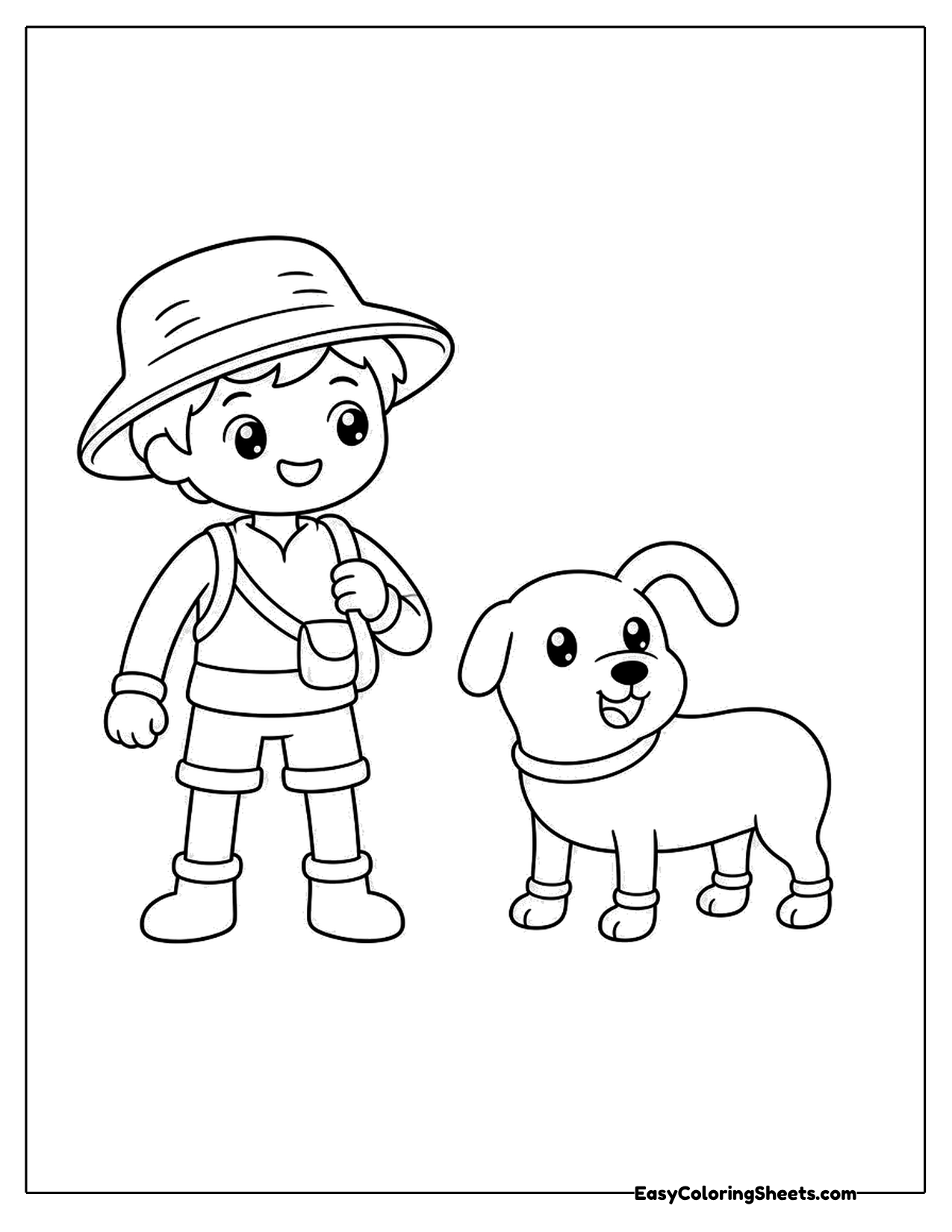 Boy in a bucket hat walking with his dog
