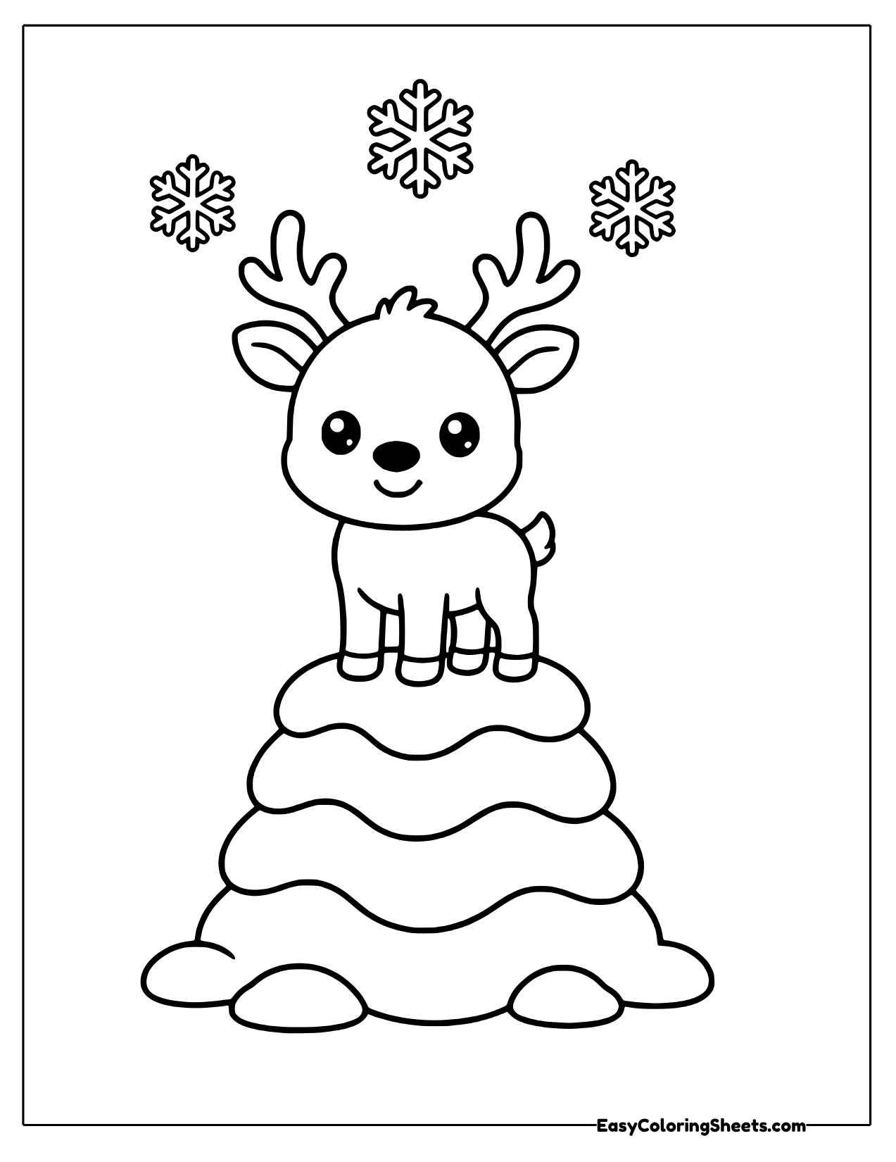 Reindeer on top of a snow mound