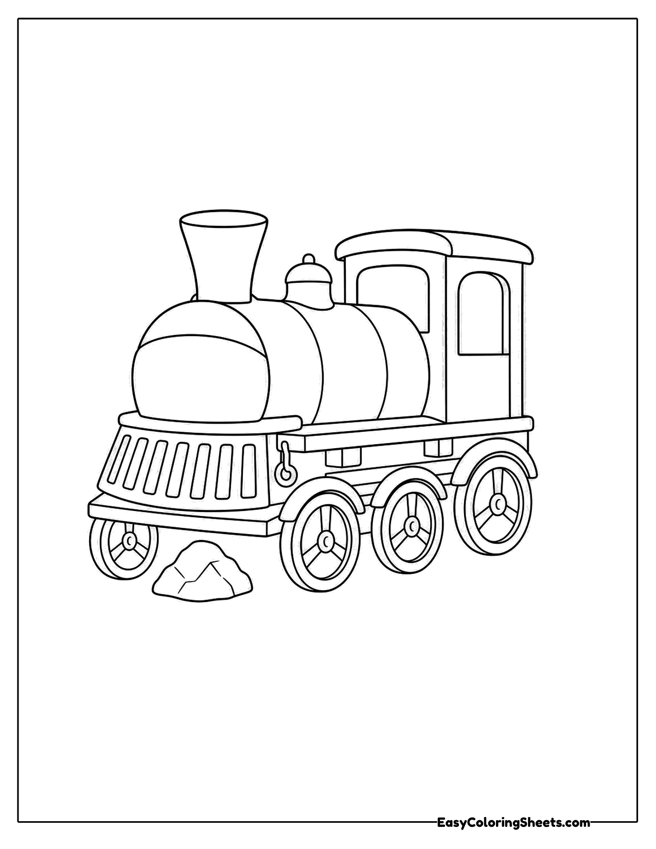 Steam engine parked beside a small rock